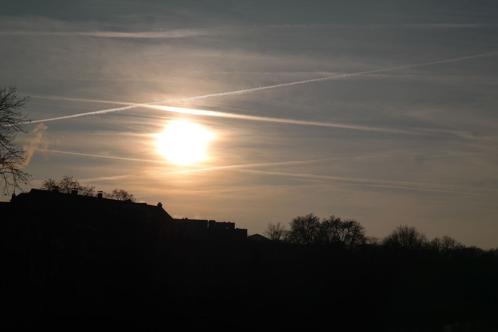 Samsung NX300 sample photo. Sunset, contrail, sun photography