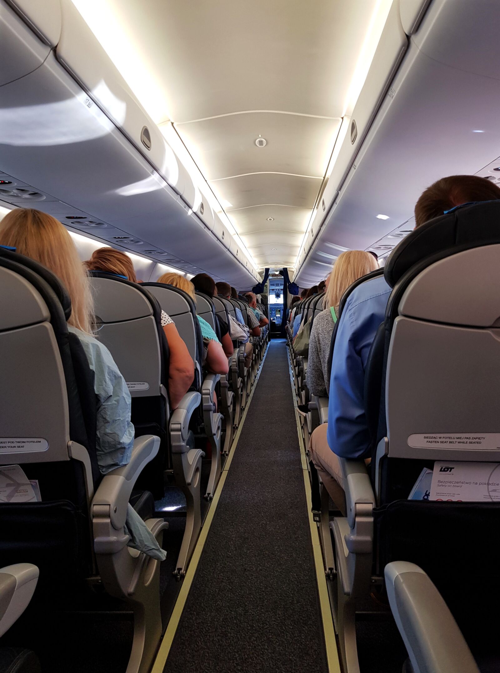 Samsung Galaxy S8 sample photo. Passengers, cabin, aircraft photography