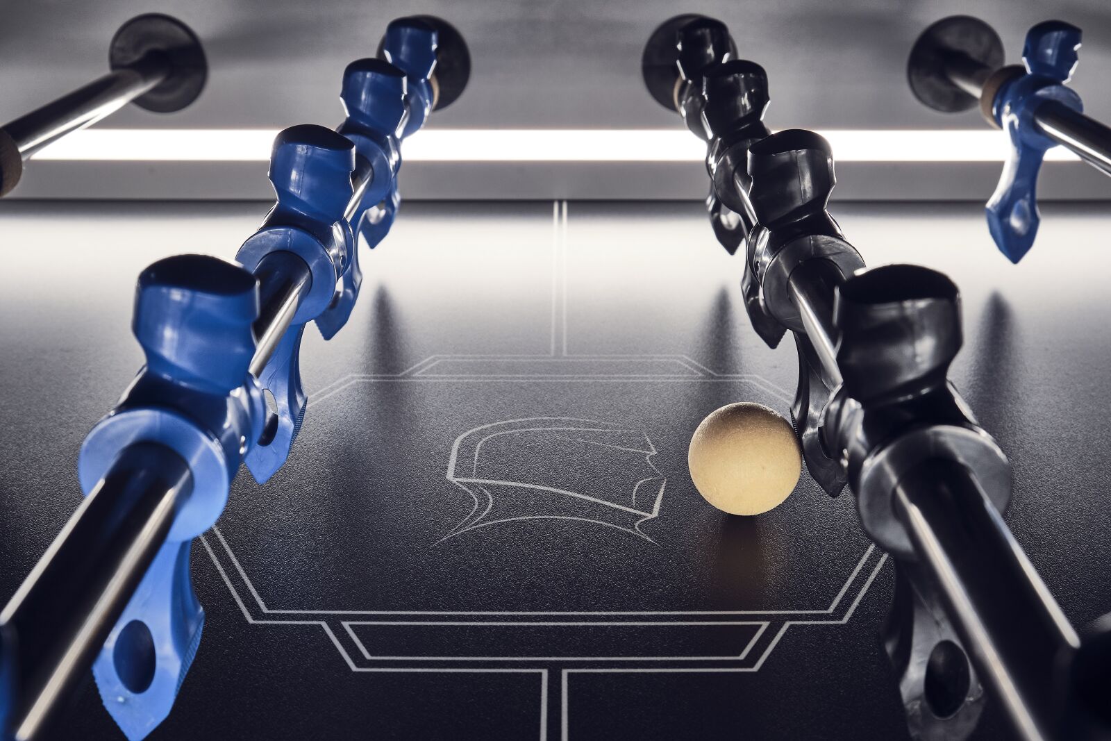Fujifilm XF 18-55mm F2.8-4 R LM OIS sample photo. Kicker, foosball table, table photography