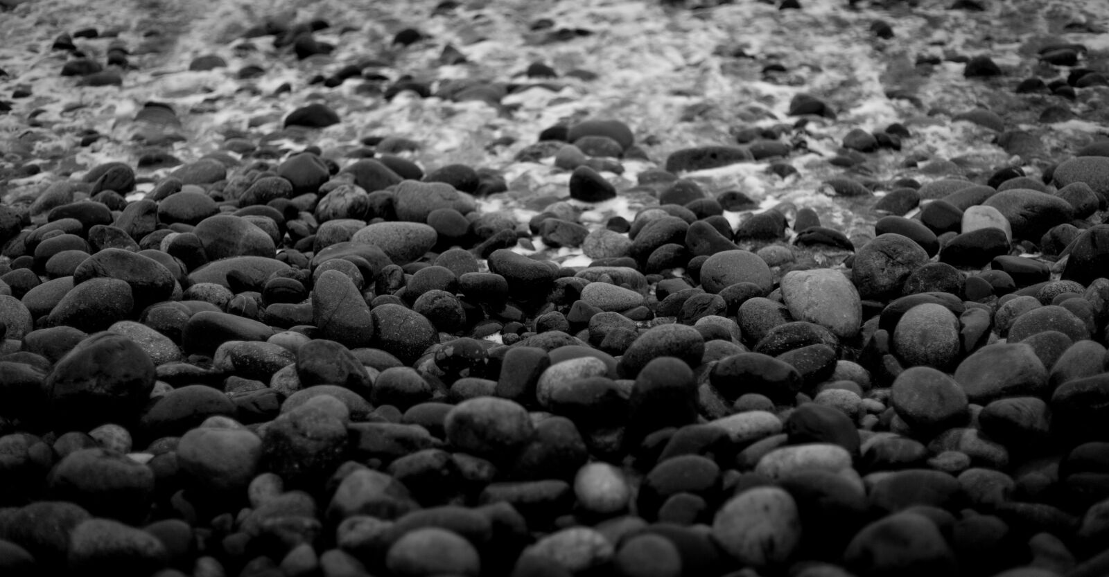 Canon EF 50mm F1.8 STM sample photo. Stones, sea, beach photography