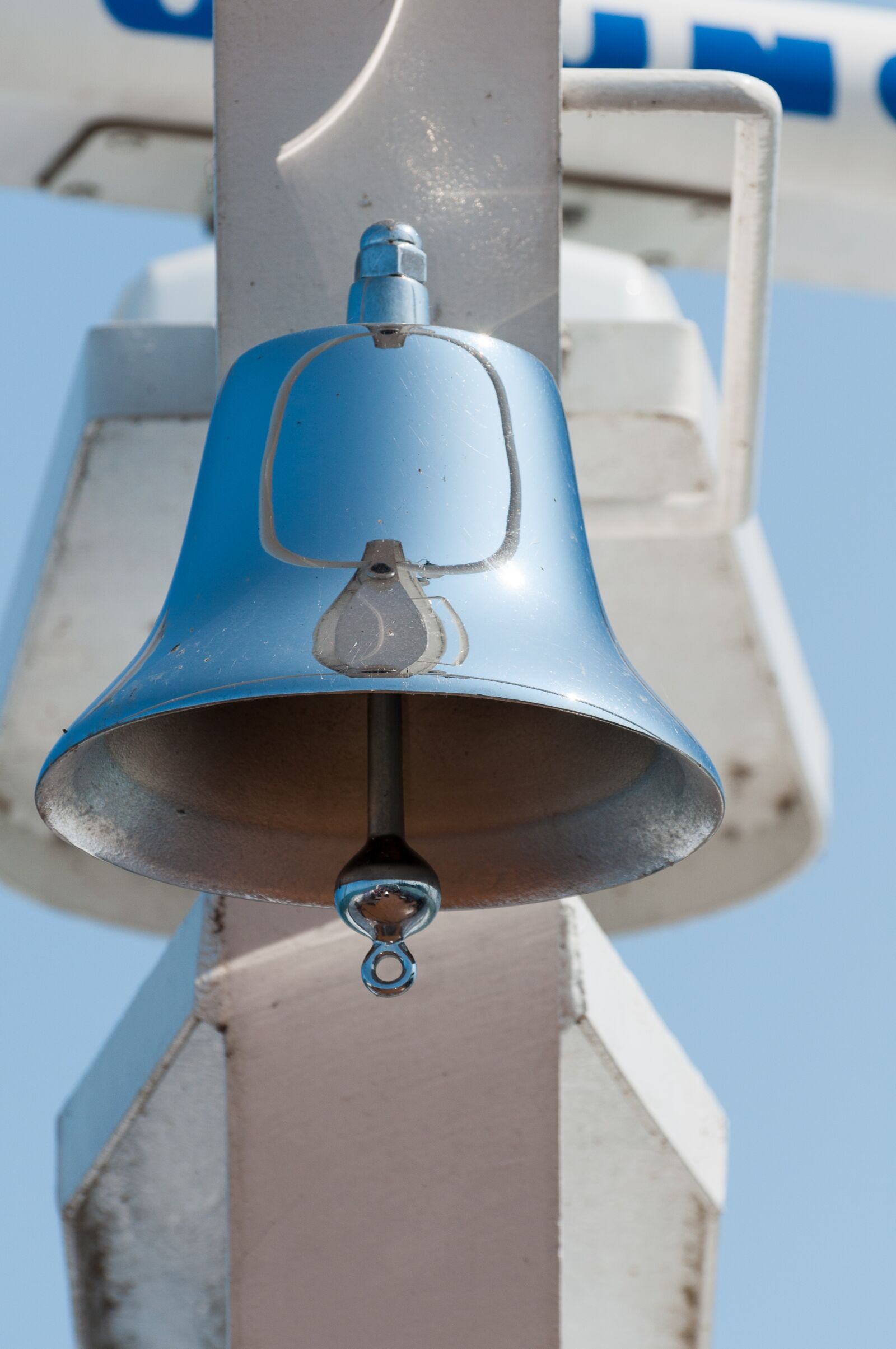 Nikon D90 sample photo. Bell, reflection, boat photography