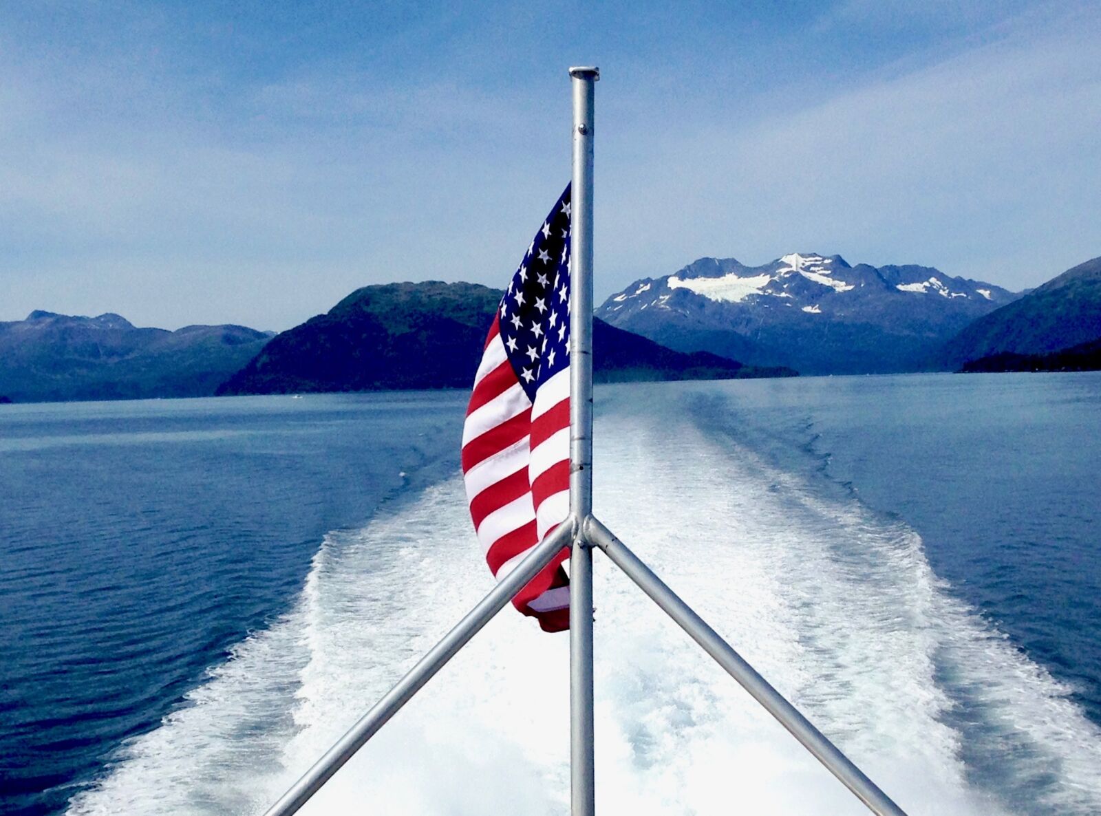 iPhone 5 back camera 4.12mm f/2.4 sample photo. Flag, wake, glacier photography