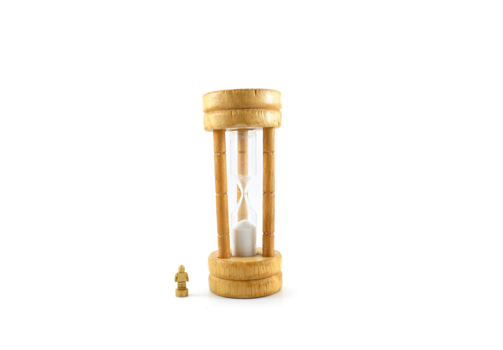 Canon EOS 1200D (EOS Rebel T5 / EOS Kiss X70 / EOS Hi) sample photo. Sand, clock, marionette photography