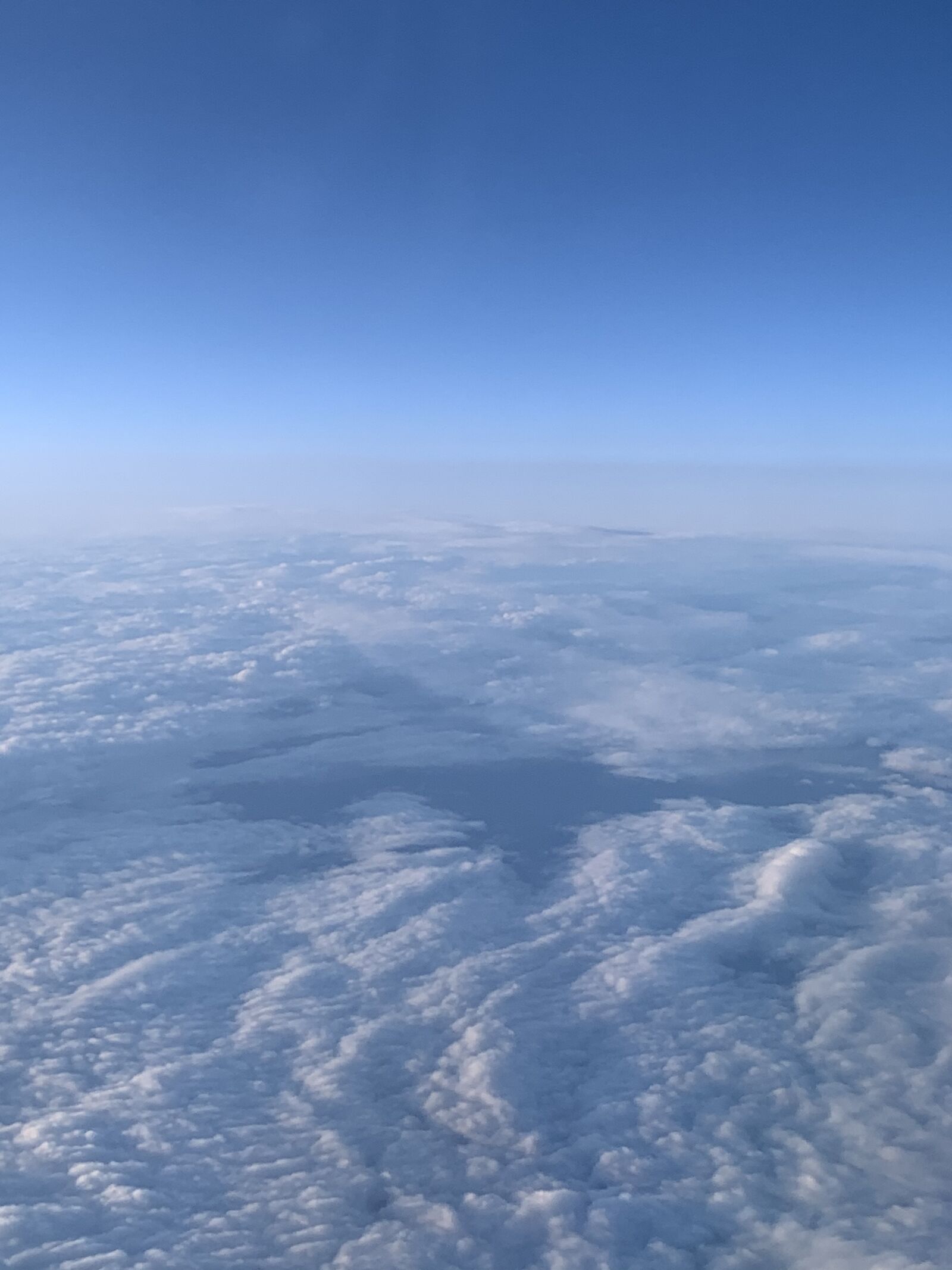 Apple iPhone XR sample photo. Clouds, flight, sky photography