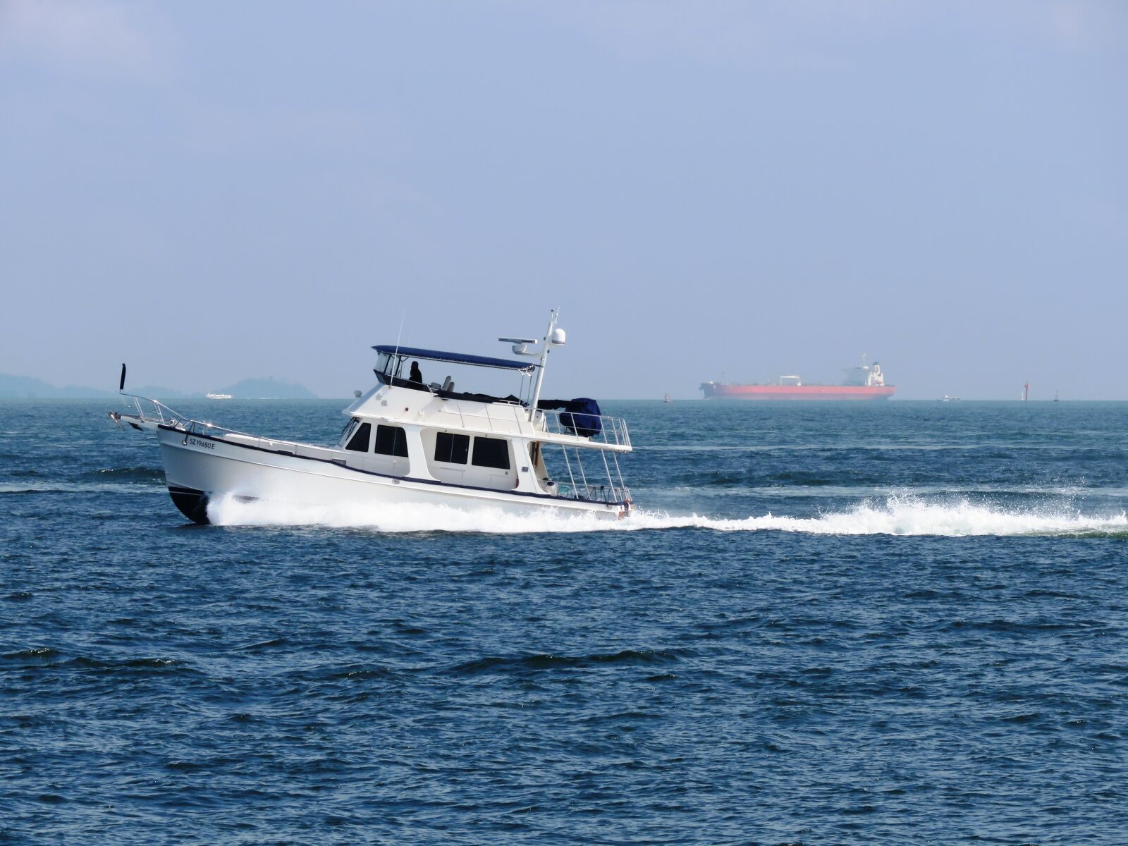 Canon PowerShot SX60 HS sample photo. Boat, speed, passenger photography