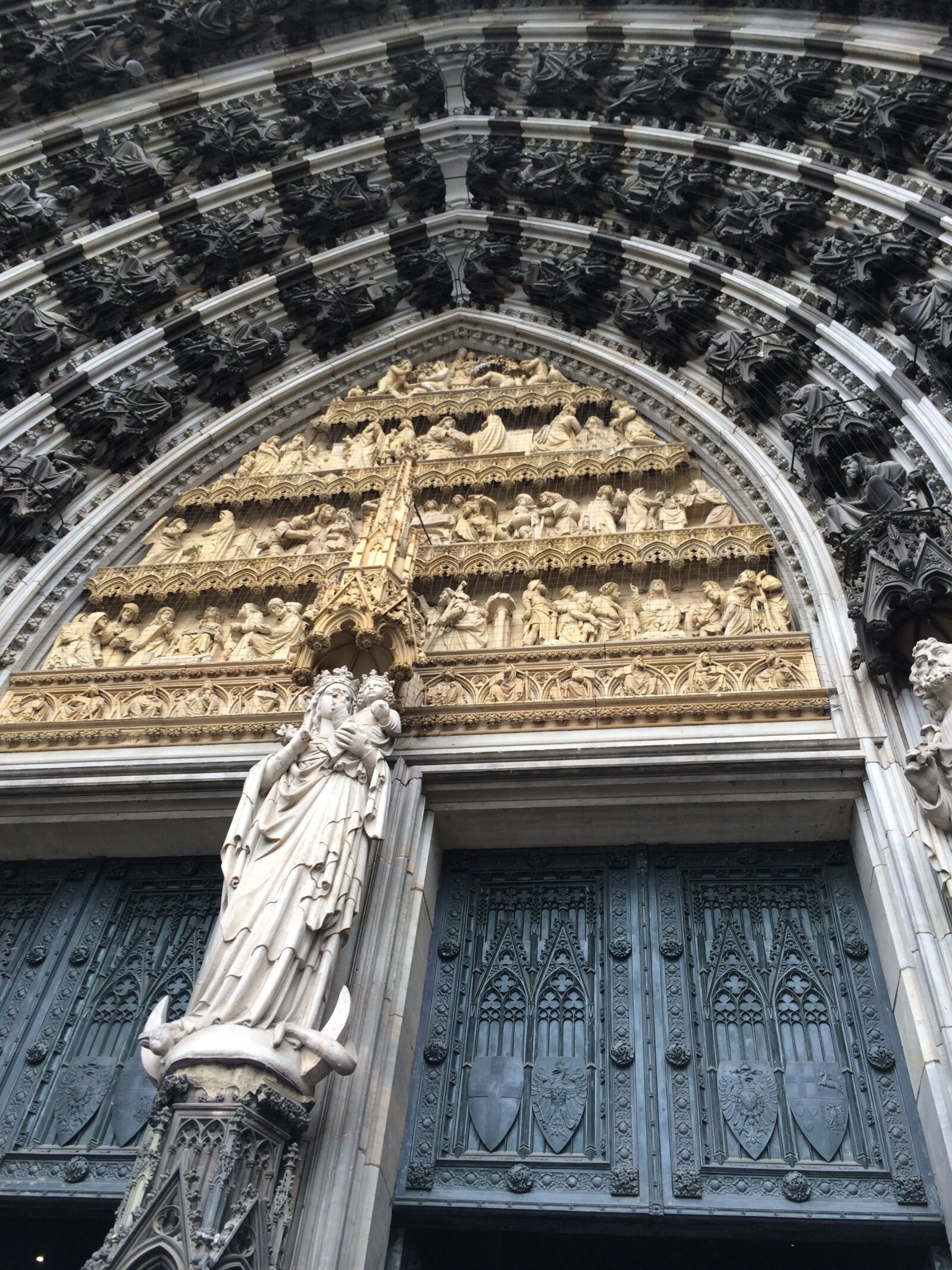 iPhone 5s back camera 4.12mm f/2.2 sample photo. Cathedral door, madonna and photography