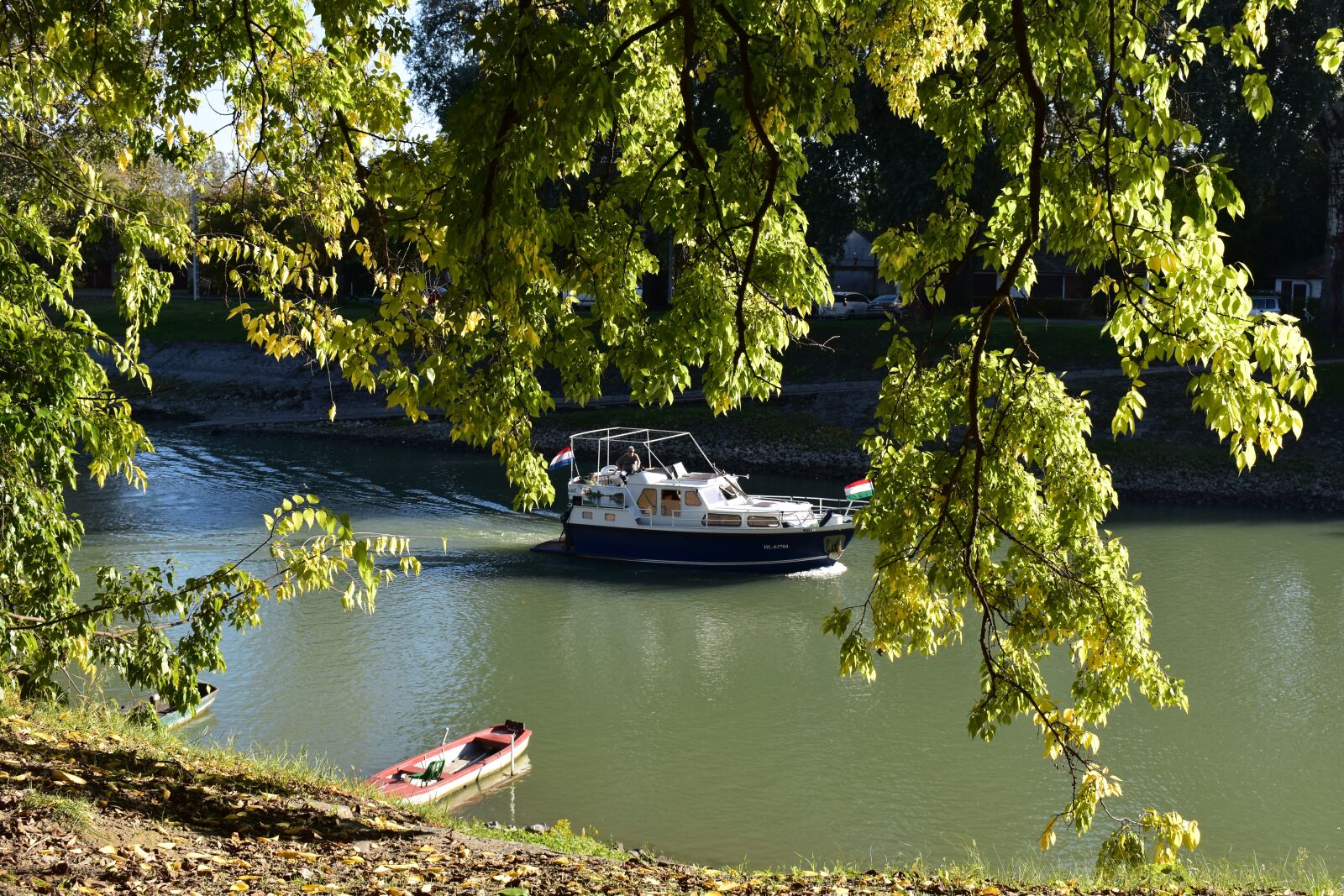 Nikon D5600 sample photo. River, small ship, boat photography