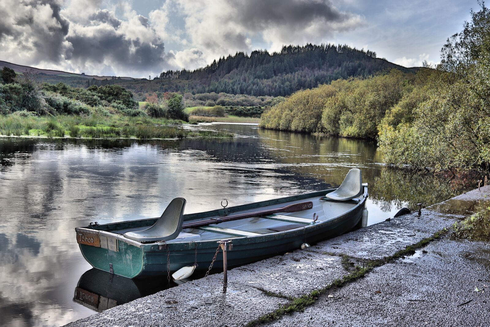 Canon EF-S 24mm F2.8 STM sample photo. River, boat, wet photography