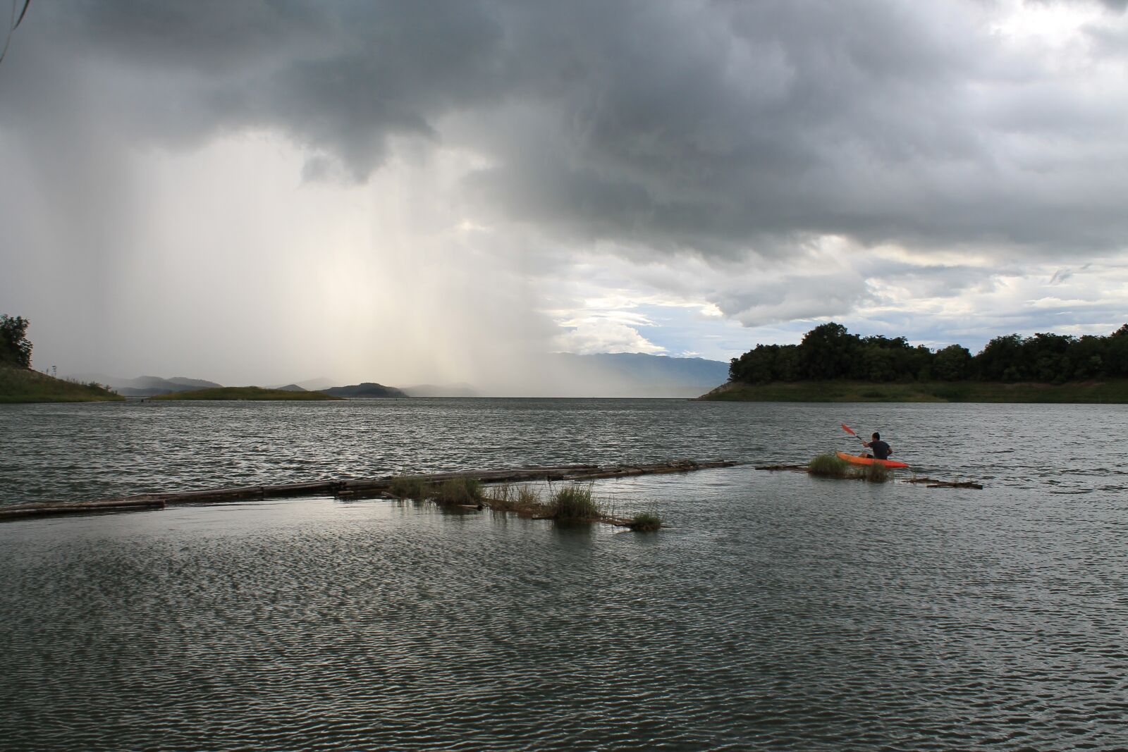 Canon EOS 1100D (EOS Rebel T3 / EOS Kiss X50) sample photo. Nature, storm, kayak photography