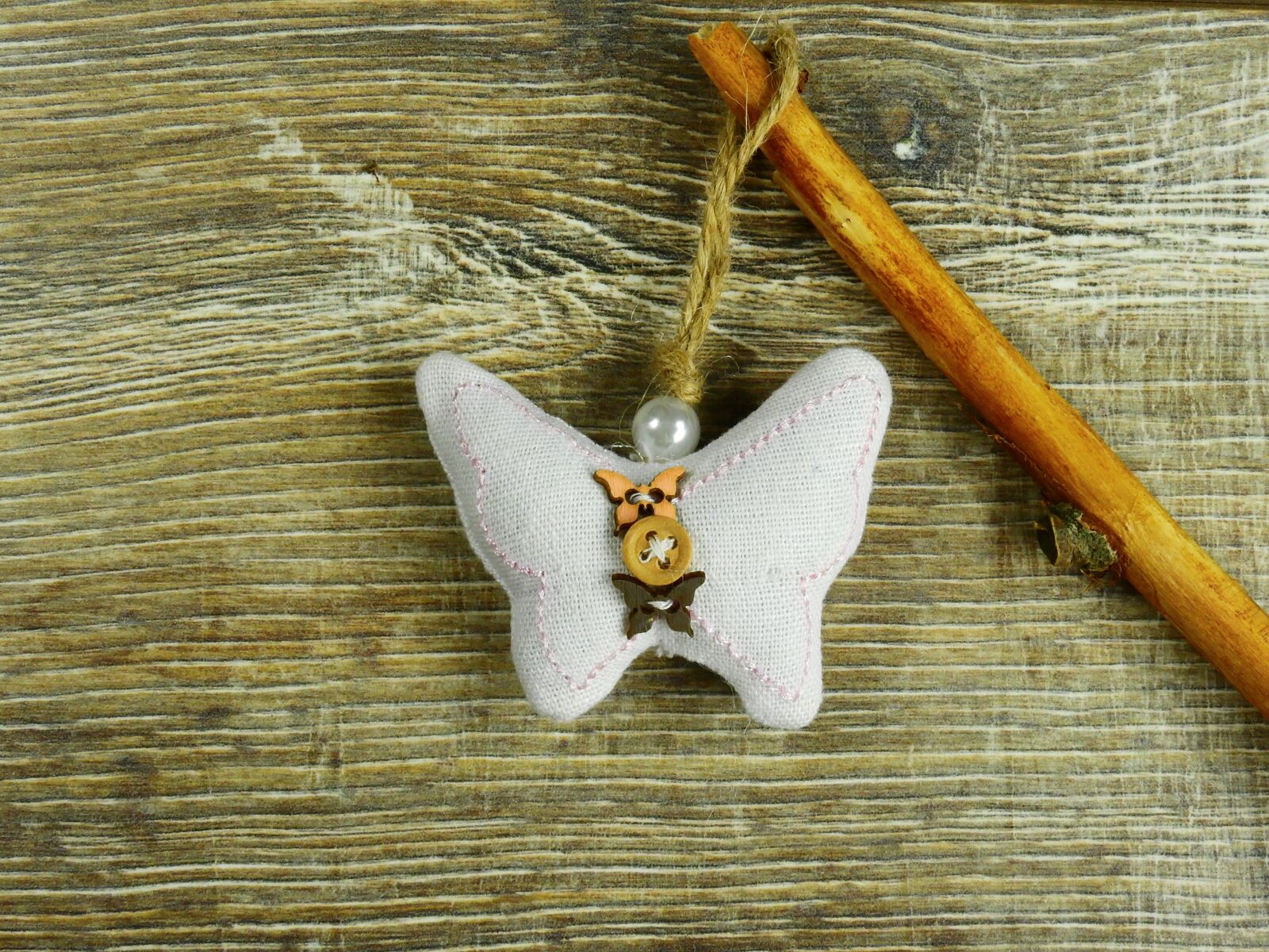 Nikon Coolpix P900 sample photo. Pillow, button, butterfly photography