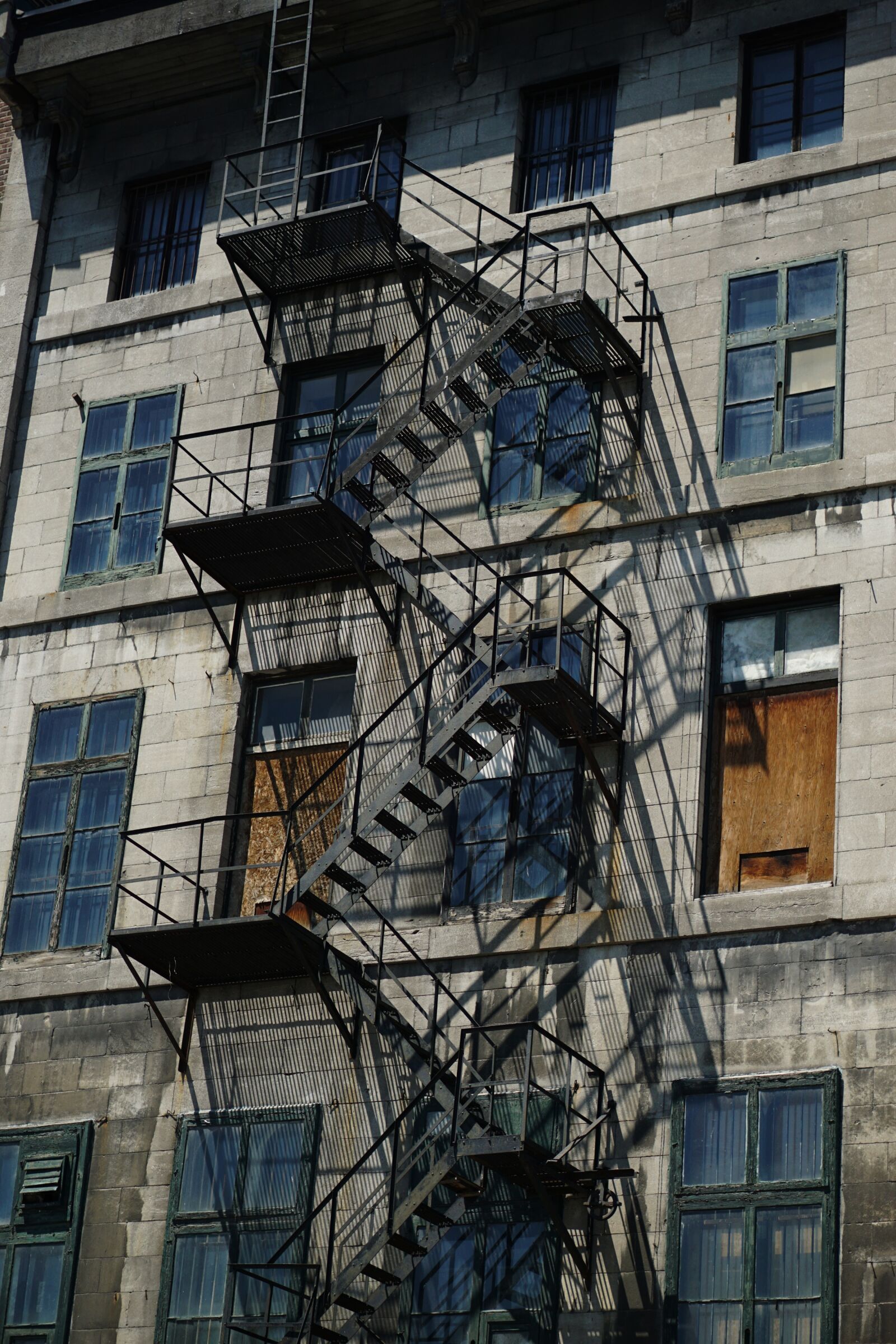 Sony a5100 + E 50mm F1.8 OSS sample photo. Stairs, shadows, architecture photography