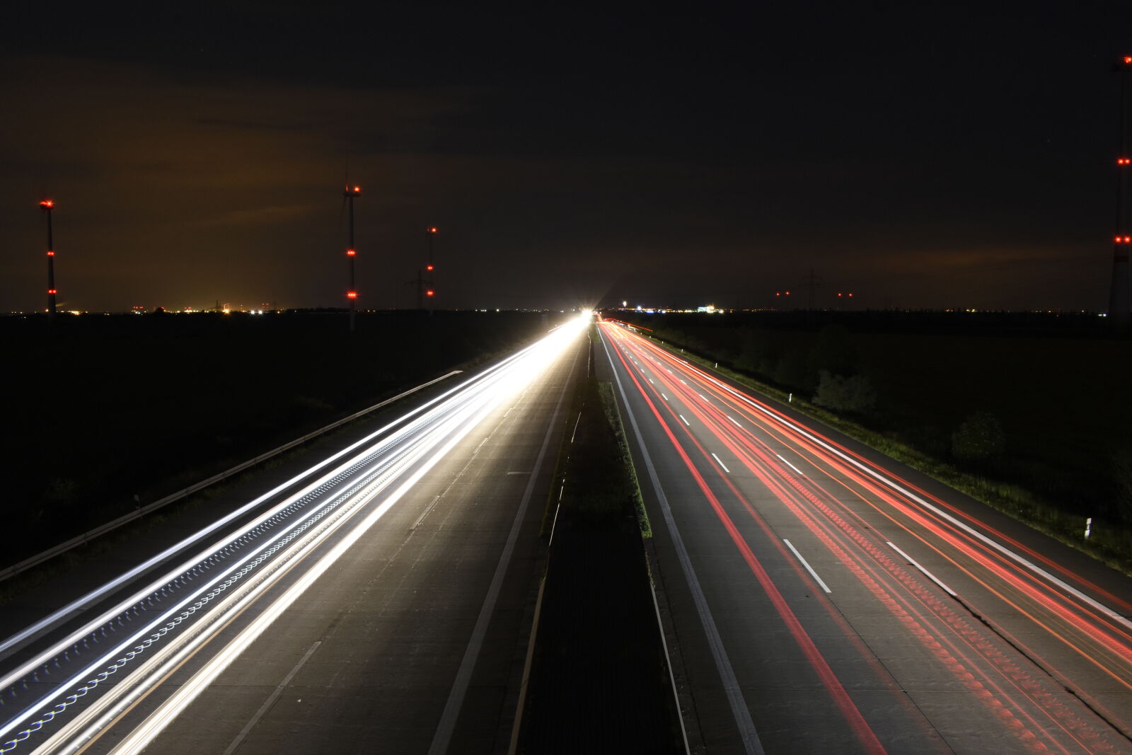 Nikon AF-P DX Nikkor 18-55mm F3.5-5.6G sample photo. Car, lights, energy, freeway photography