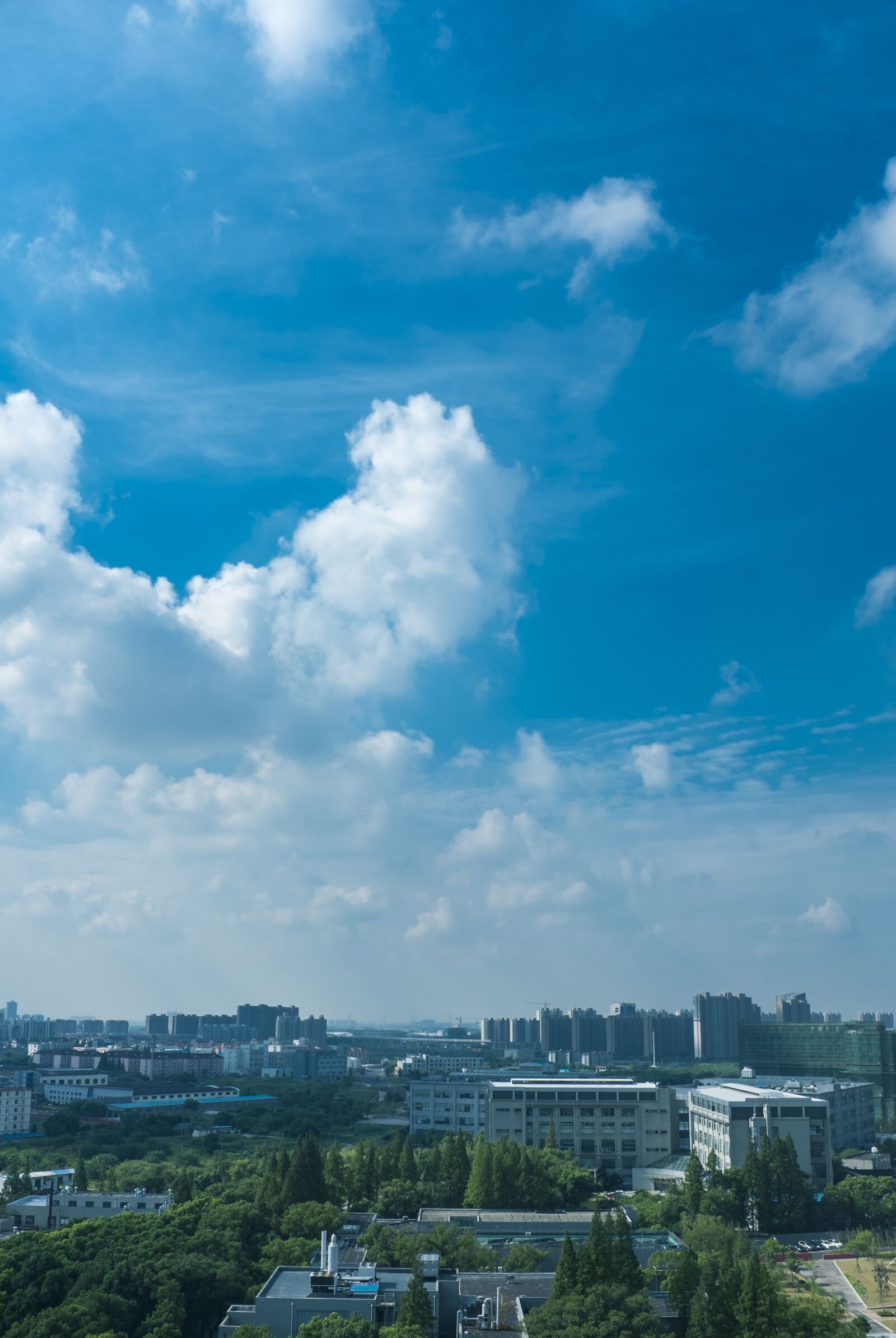 Fujifilm X100S sample photo. Sky, blue sky, city photography