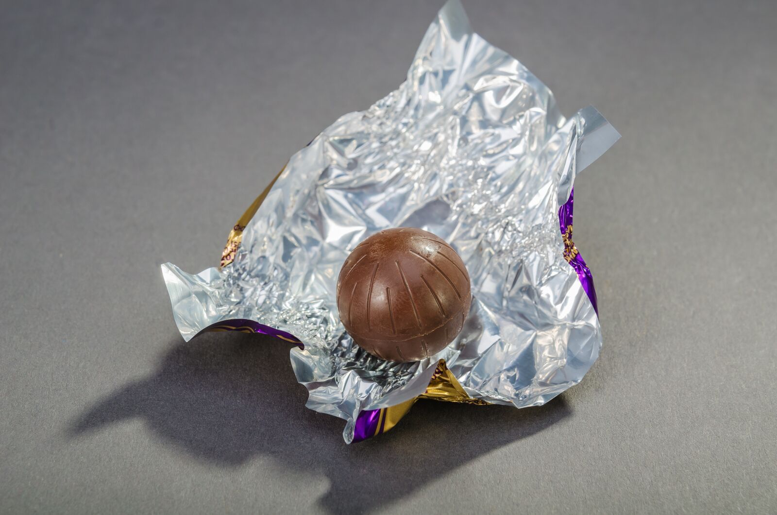 Nikon D7000 sample photo. Foil, chocolate, open photography