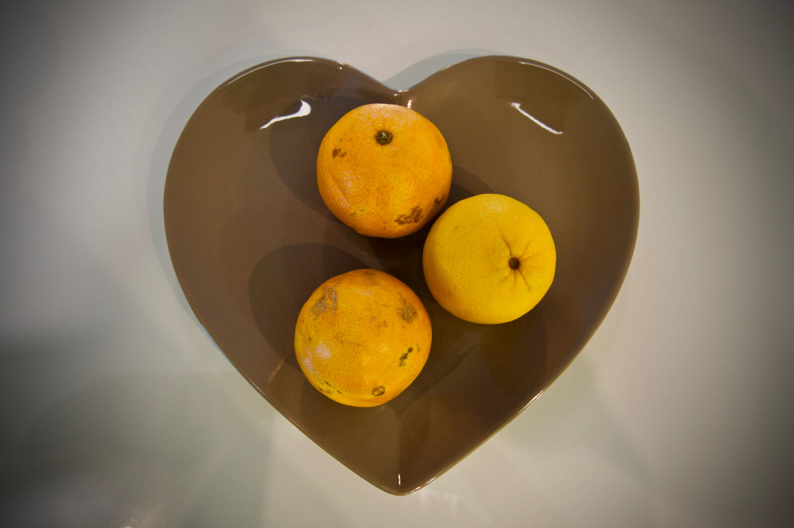 Nikon D3200 sample photo. Bowl, orange, heart photography