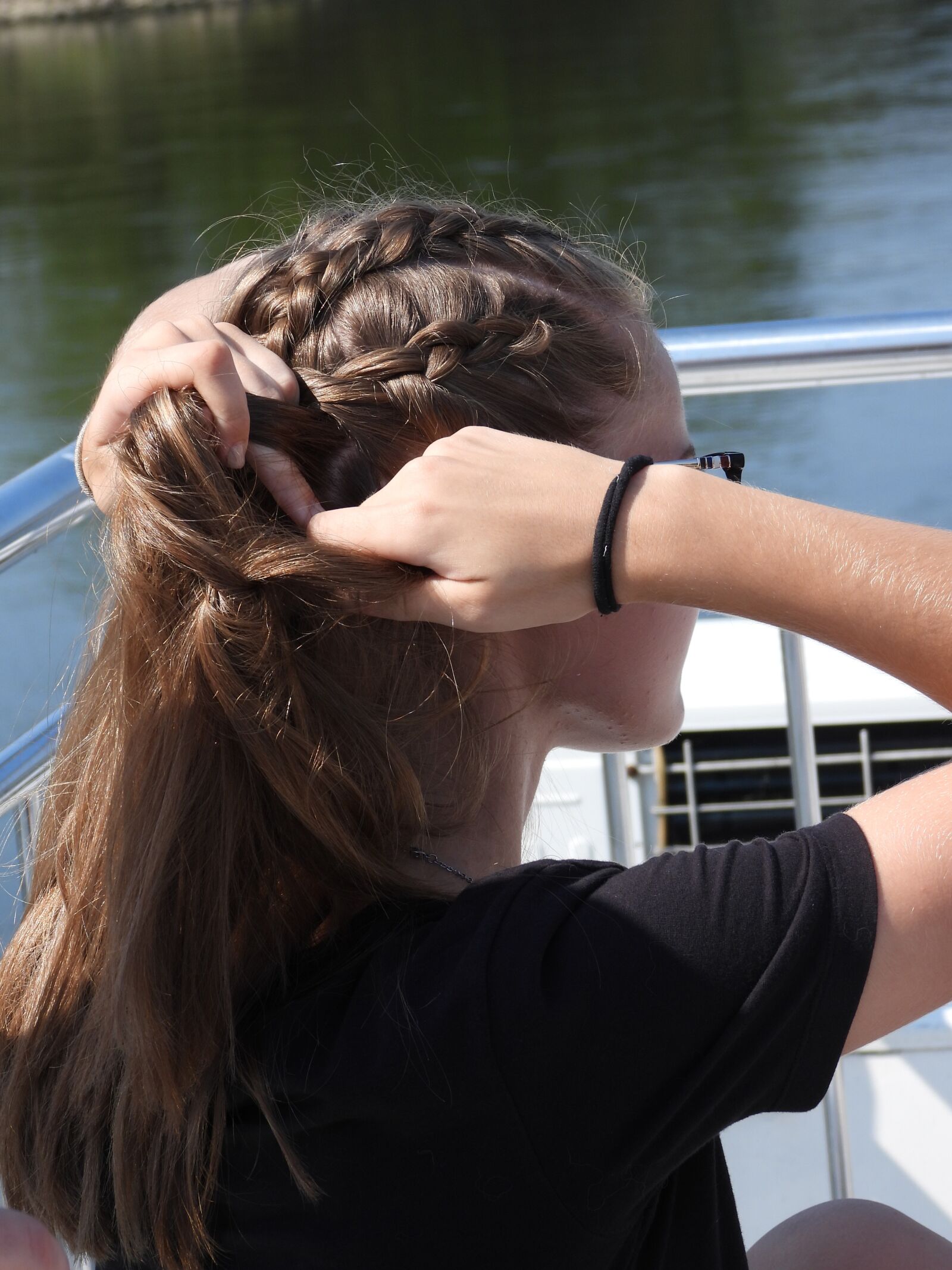 Nikon Coolpix P1000 sample photo. Girl, splicing pigtails, hair photography