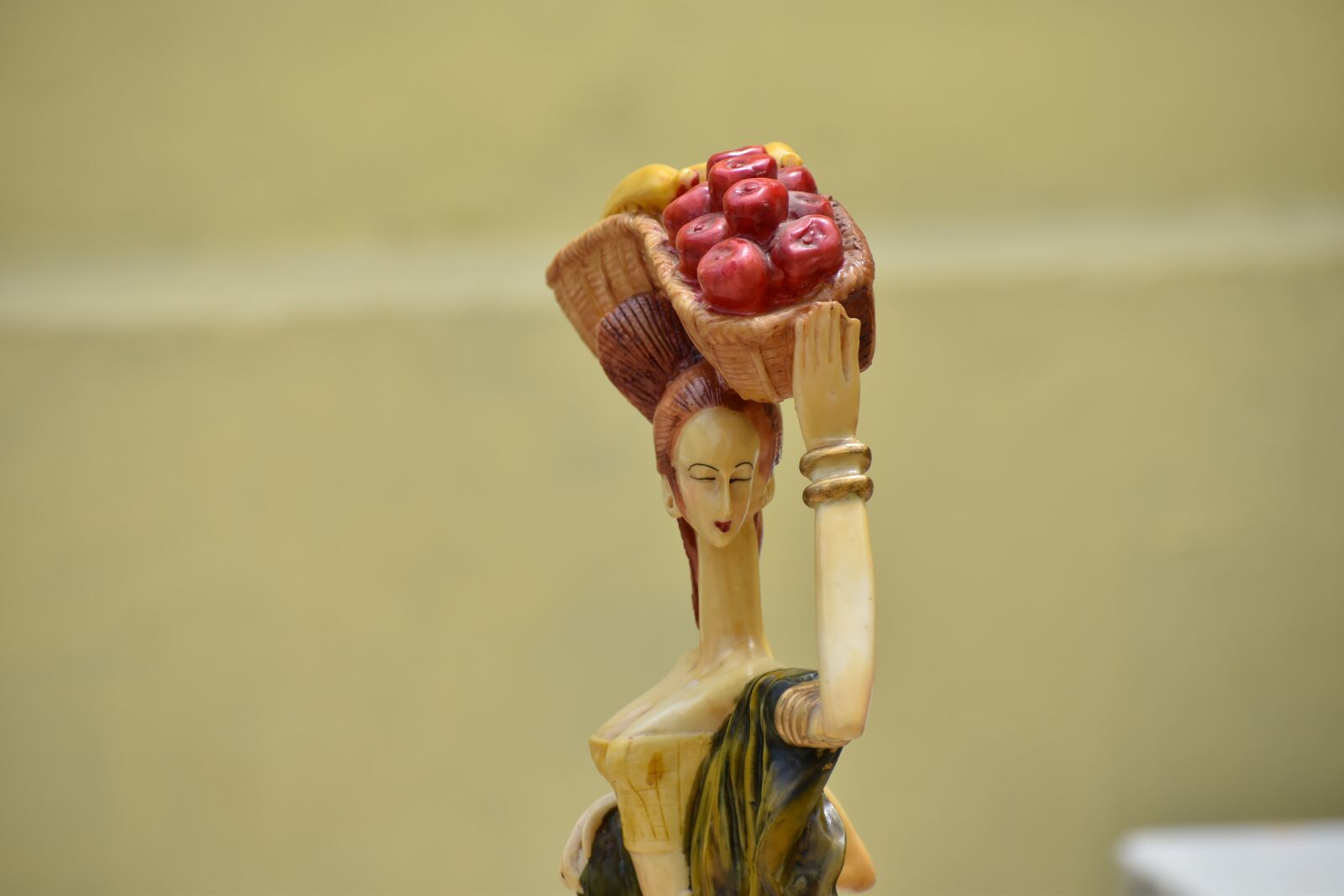 Nikon D5600 sample photo. Fruit seller, woman, statue photography