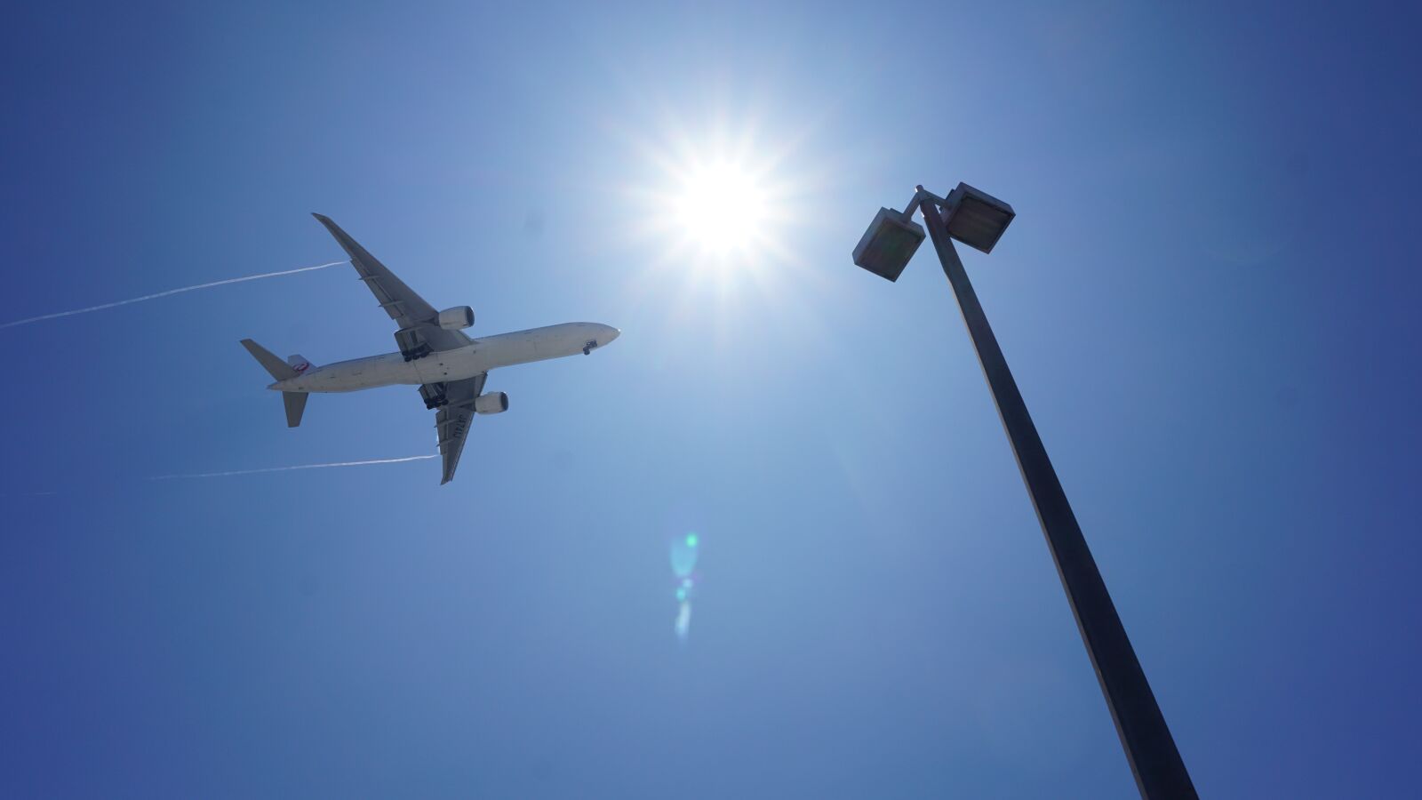 Sony E 16-50mm F3.5-5.6 PZ OSS sample photo. Aircraft, sun, sky photography
