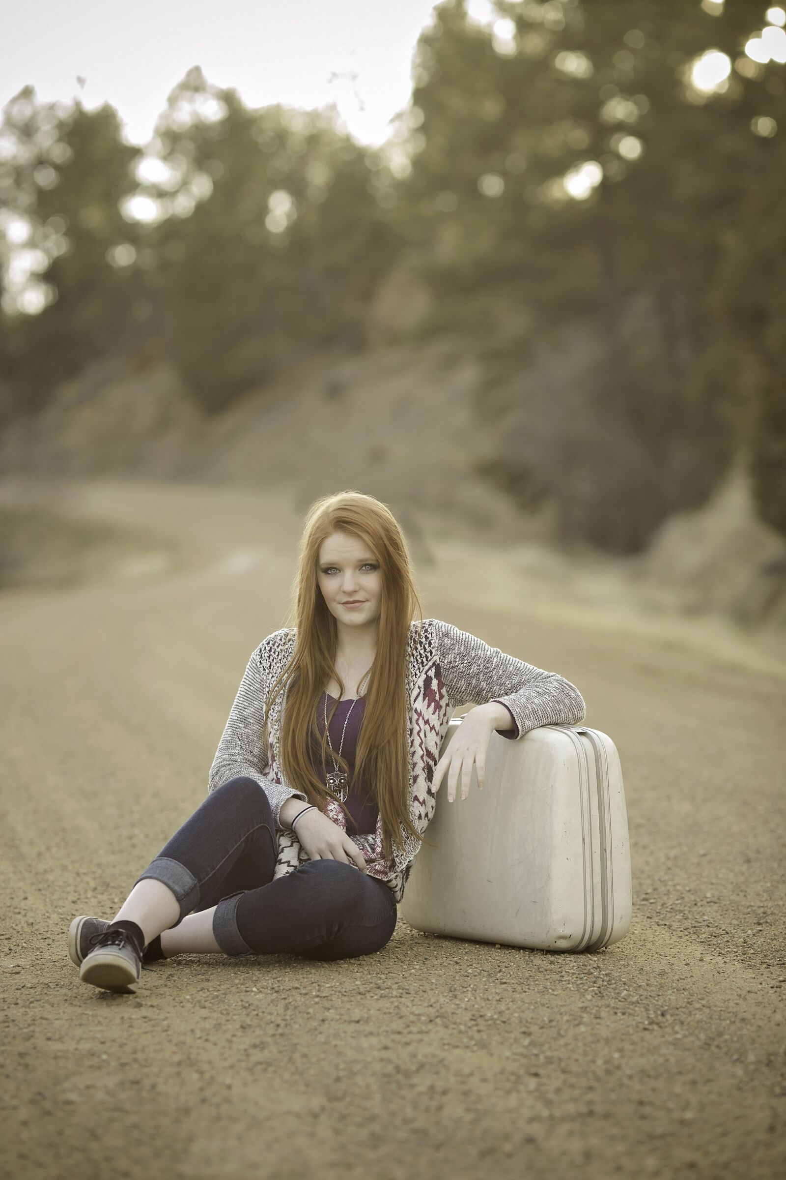 Canon EOS 6D + Canon EF 135mm F2L USM sample photo. Redhead, suitcase, road photography