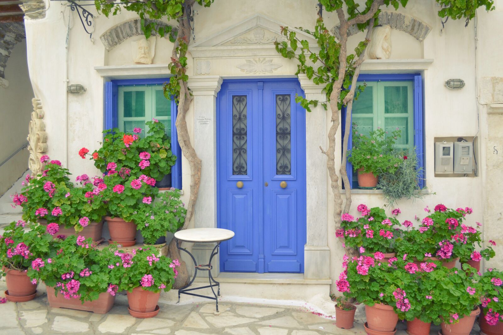 Nikon D3100 sample photo. Greek island door, tinos photography