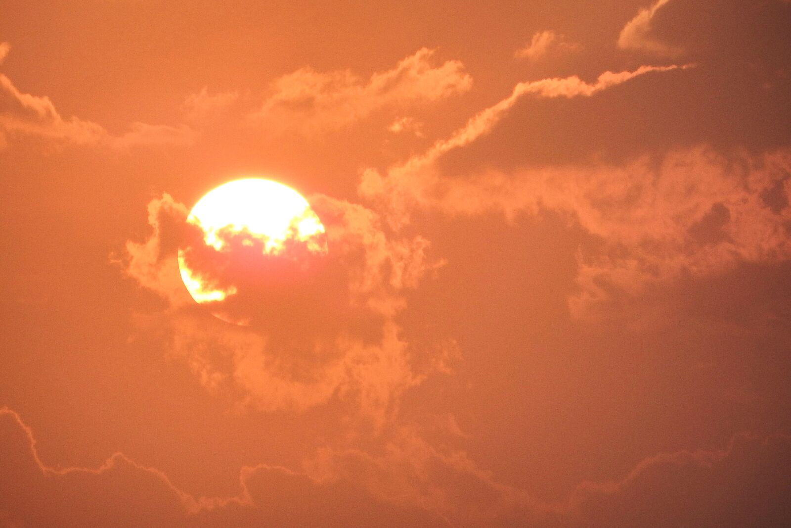Fujifilm FinePix SL1000 sample photo. Sunrise, clouds, hazy photography