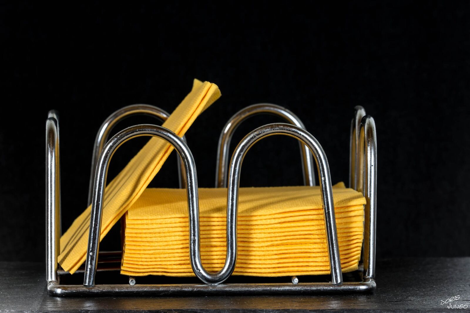 Nikon D7200 sample photo. Towels, yellow, black background photography