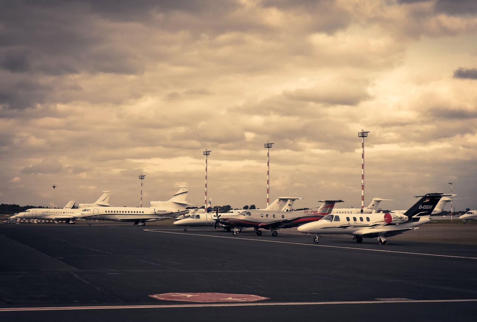 Olympus OM-D E-M10 sample photo. Airport, aircraft, field photography