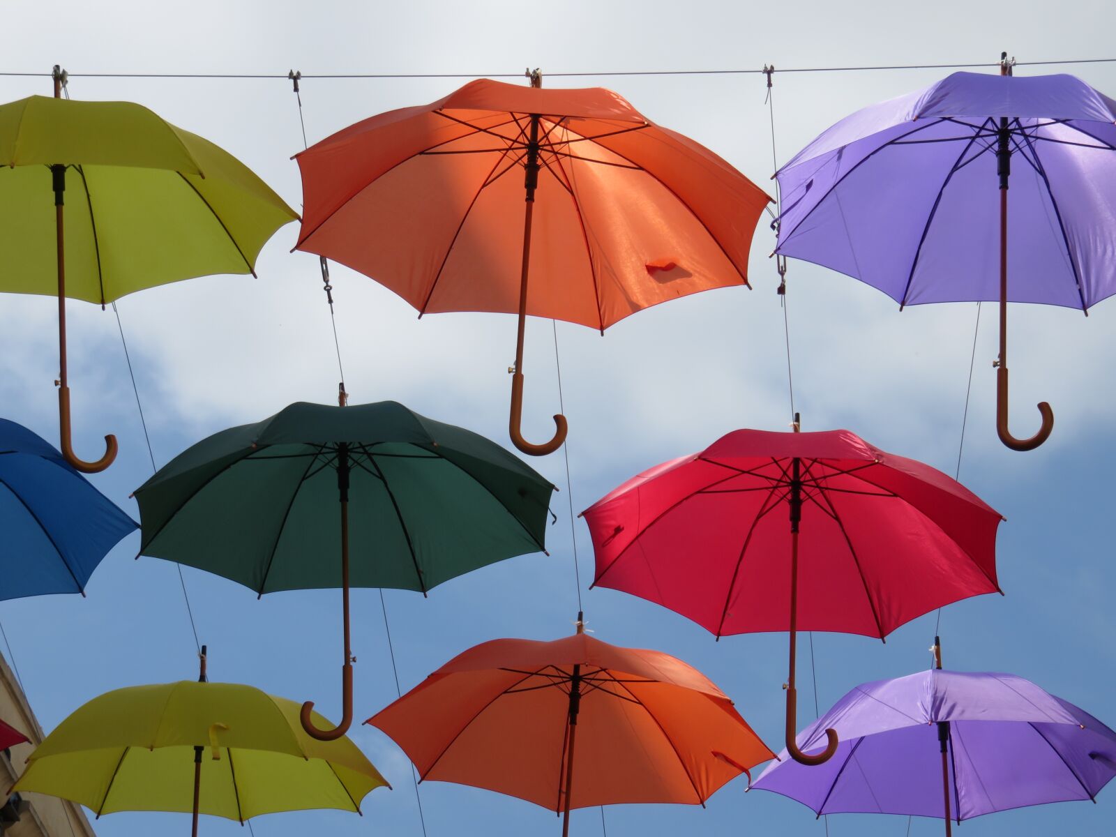 Canon PowerShot SX700 HS sample photo. Umbrellas, sky, colourful photography