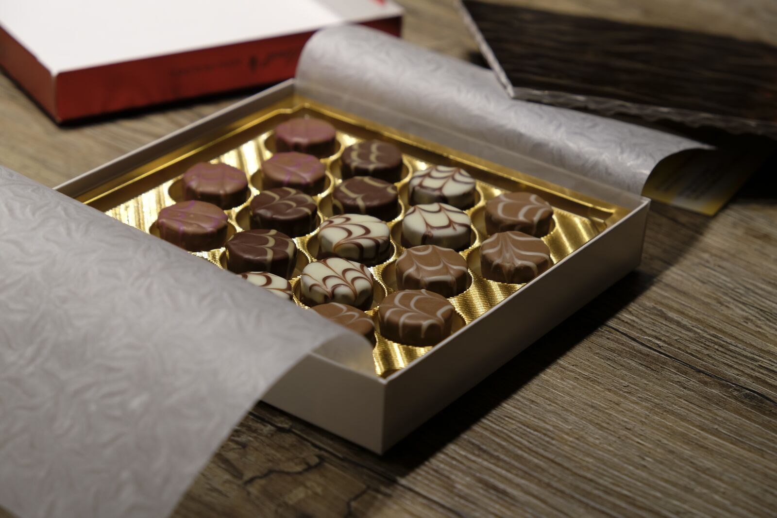 Fujifilm XF 18-55mm F2.8-4 R LM OIS sample photo. Chocolates, chocolate, candy photography