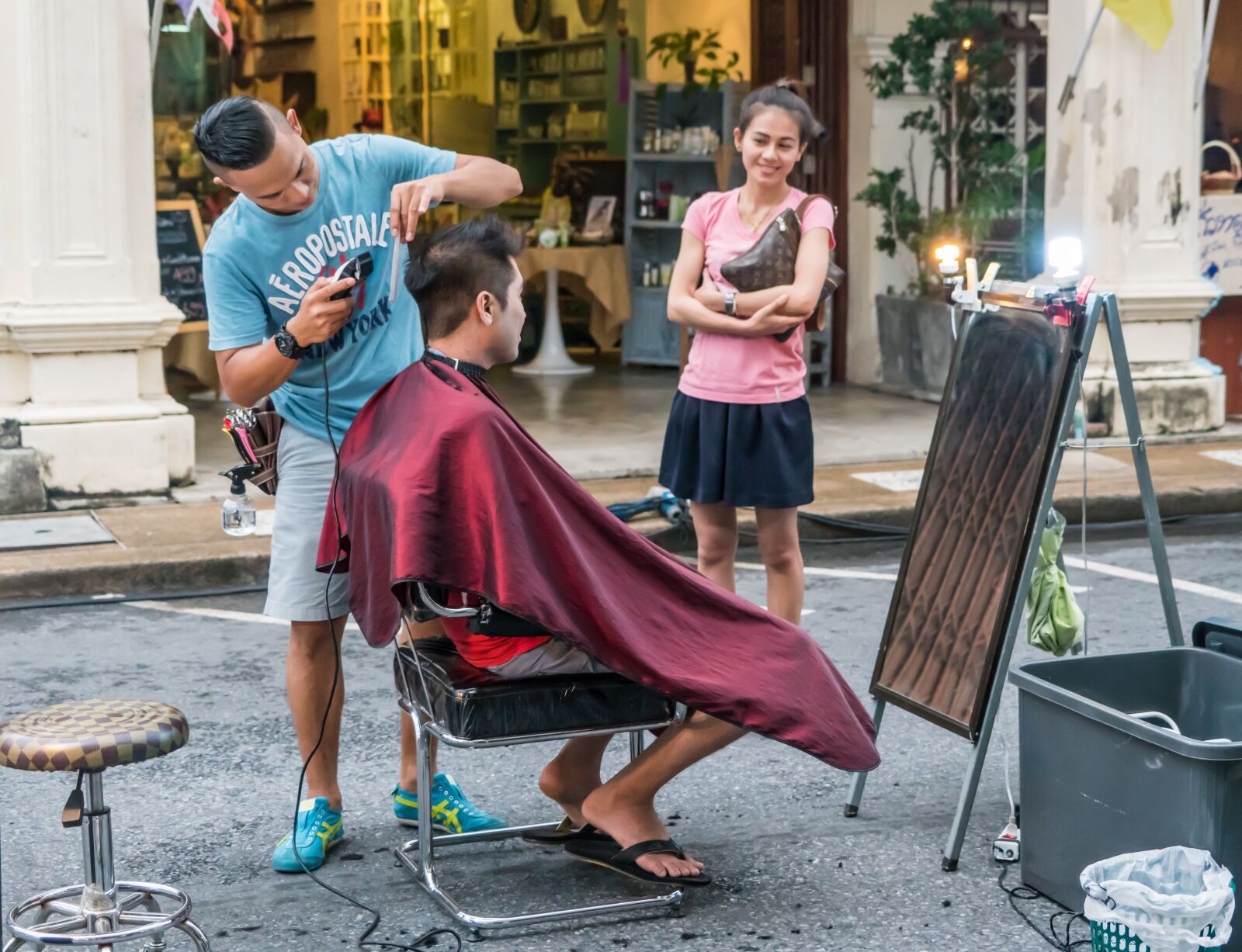 Sony a7R II + Sony FE 24-240mm F3.5-6.3 OSS sample photo. Hair salon, street, people photography