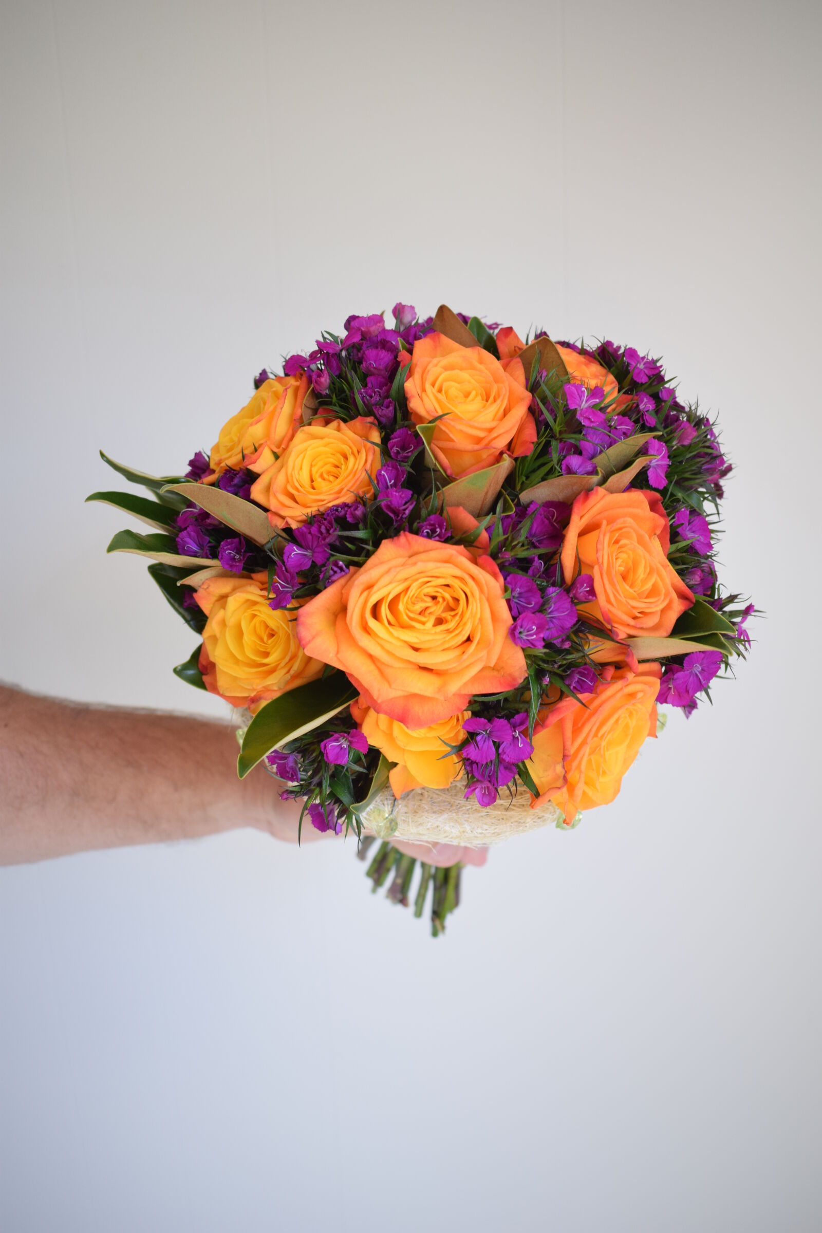 Nikon AF-P DX Nikkor 18-55mm F3.5-5.6G sample photo. Burnt, orange, roses, sweet photography