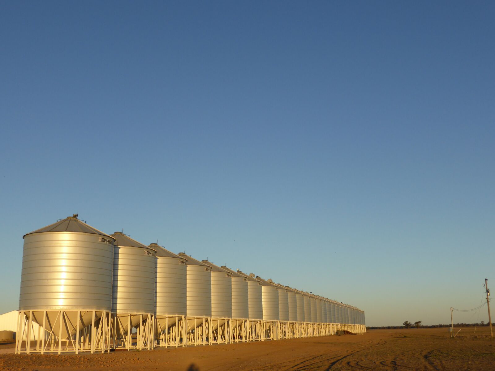 Panasonic Lumix DMC-ZS30 (Lumix DMC-TZ40) sample photo. Silo, grain, farmer photography