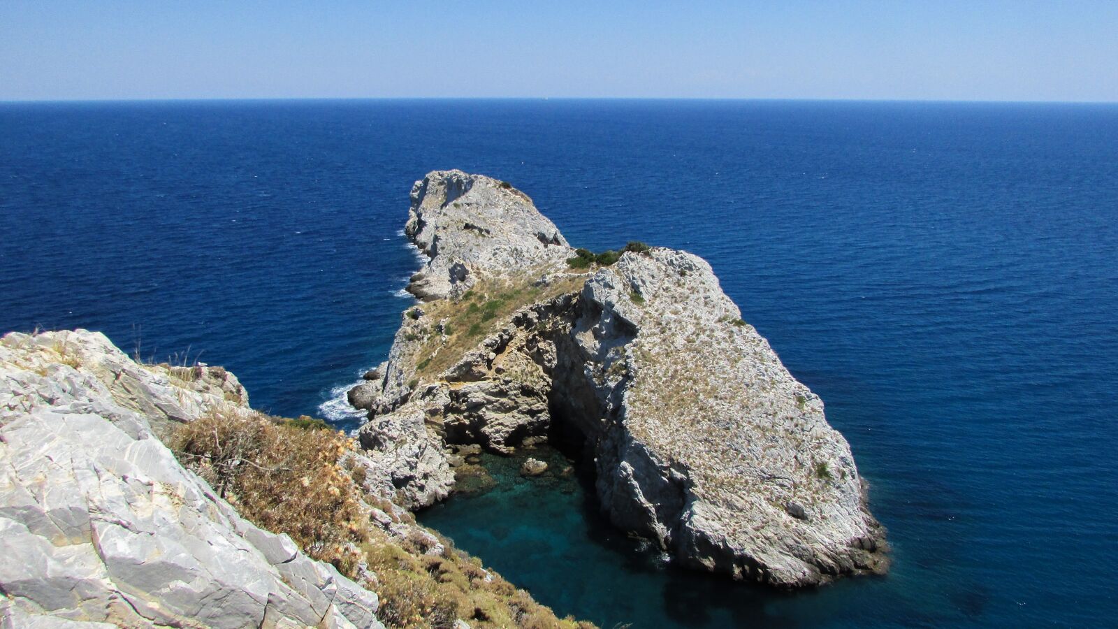 Canon PowerShot SX400 IS sample photo. Cape, rocky coast, cliffs photography
