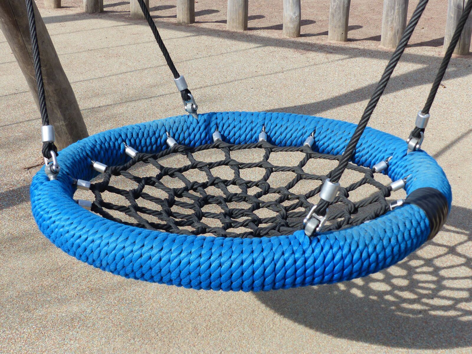 Panasonic Lumix DMC-FZ200 sample photo. Swing, children's playground, blue photography