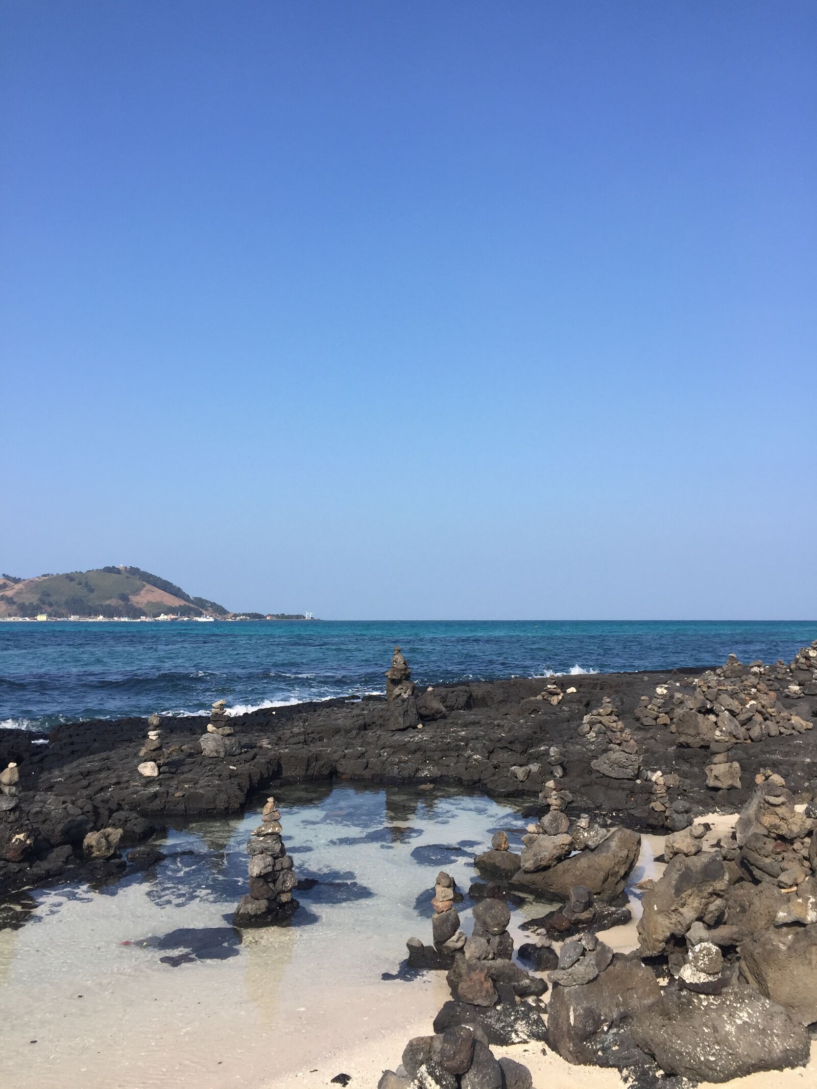 iPhone 6 back camera 4.15mm f/2.2 sample photo. Blue, sky, hyeopjae beach photography