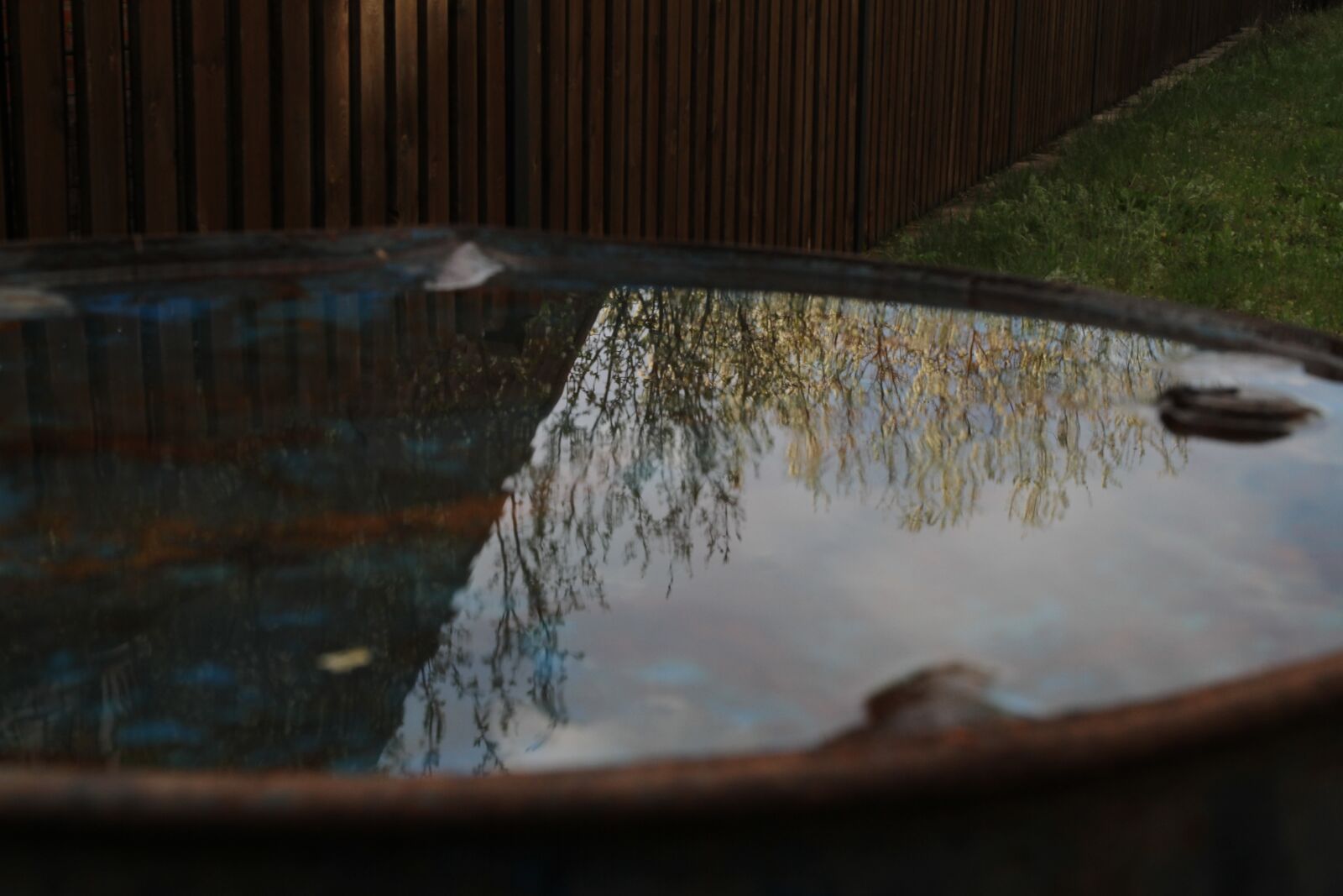 Canon EOS 7D sample photo. Barrel, rain, reflection photography