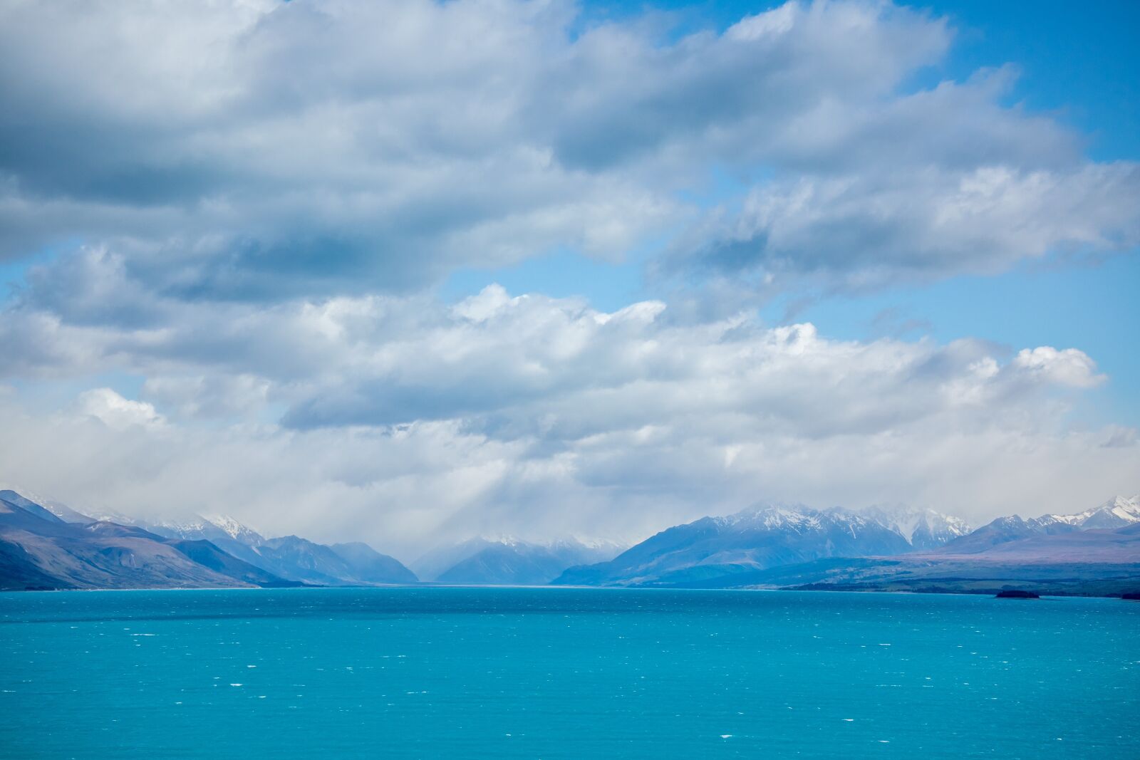 Nikon 1 Nikkor VR 10-30mm F3.5-5.6 PD-Zoom sample photo. New zealand, water, mountains photography