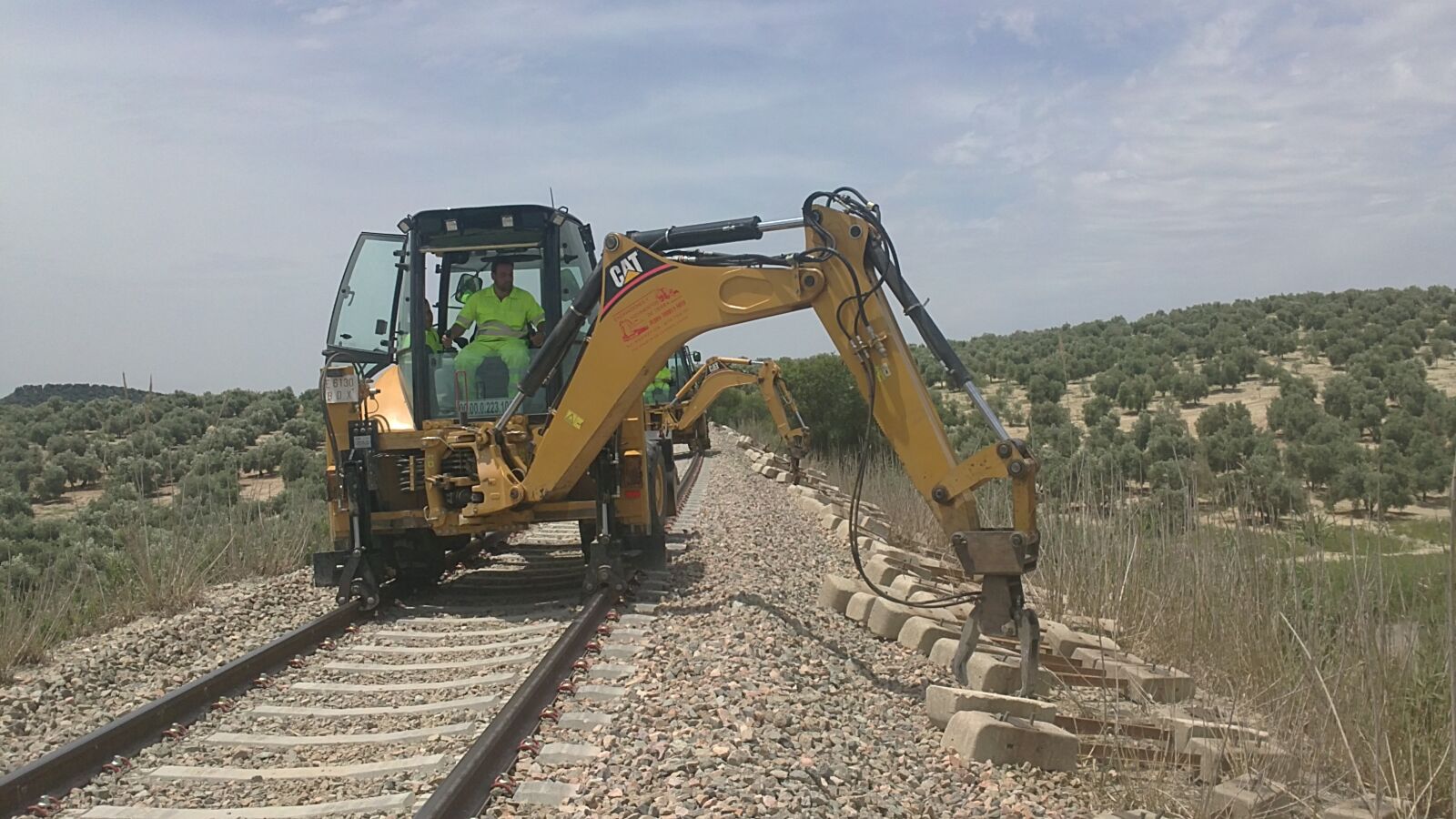 Sony Ericsson U5i sample photo. Train, sleepers, excavator photography