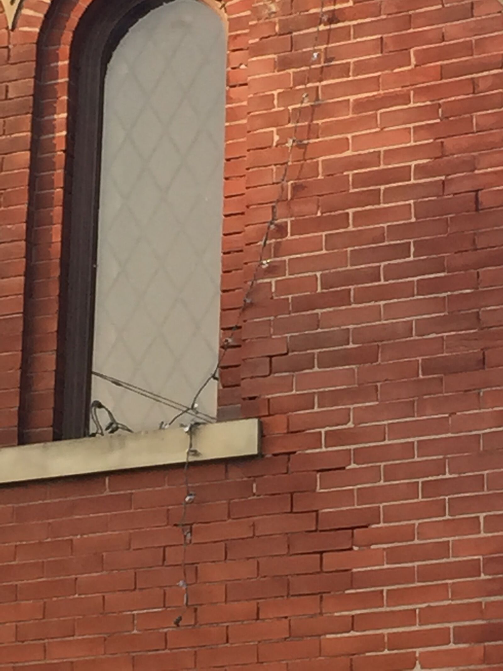 Apple iPhone 6 sample photo. Brick, window photography