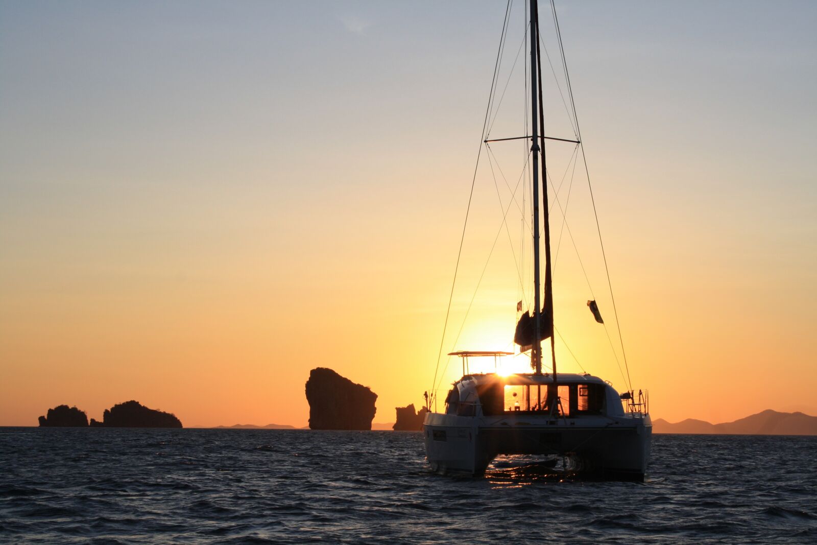 Canon EOS 1000D (EOS Digital Rebel XS / EOS Kiss F) sample photo. Sunset, catamaran, yacht photography