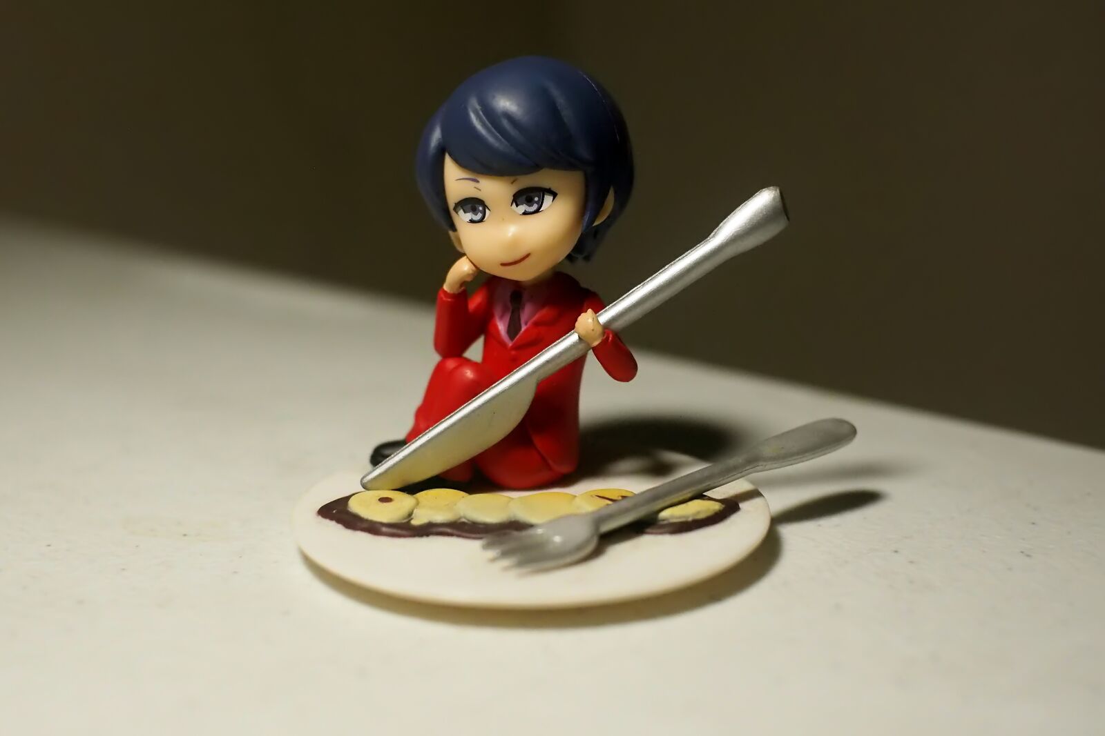 7artisans 25mm F1.8 sample photo. Toy, figurine, young photography