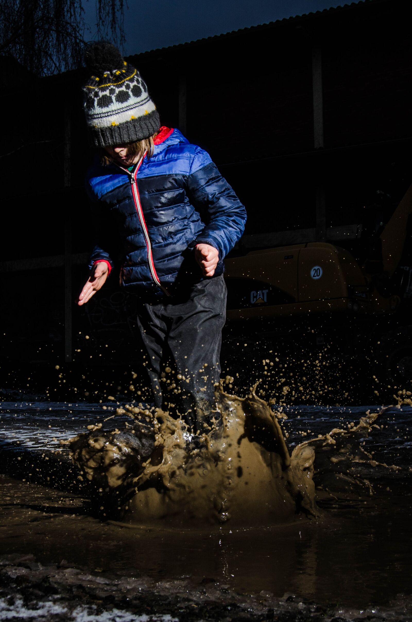 Nikon D7000 sample photo. Puddle, child, winter photography