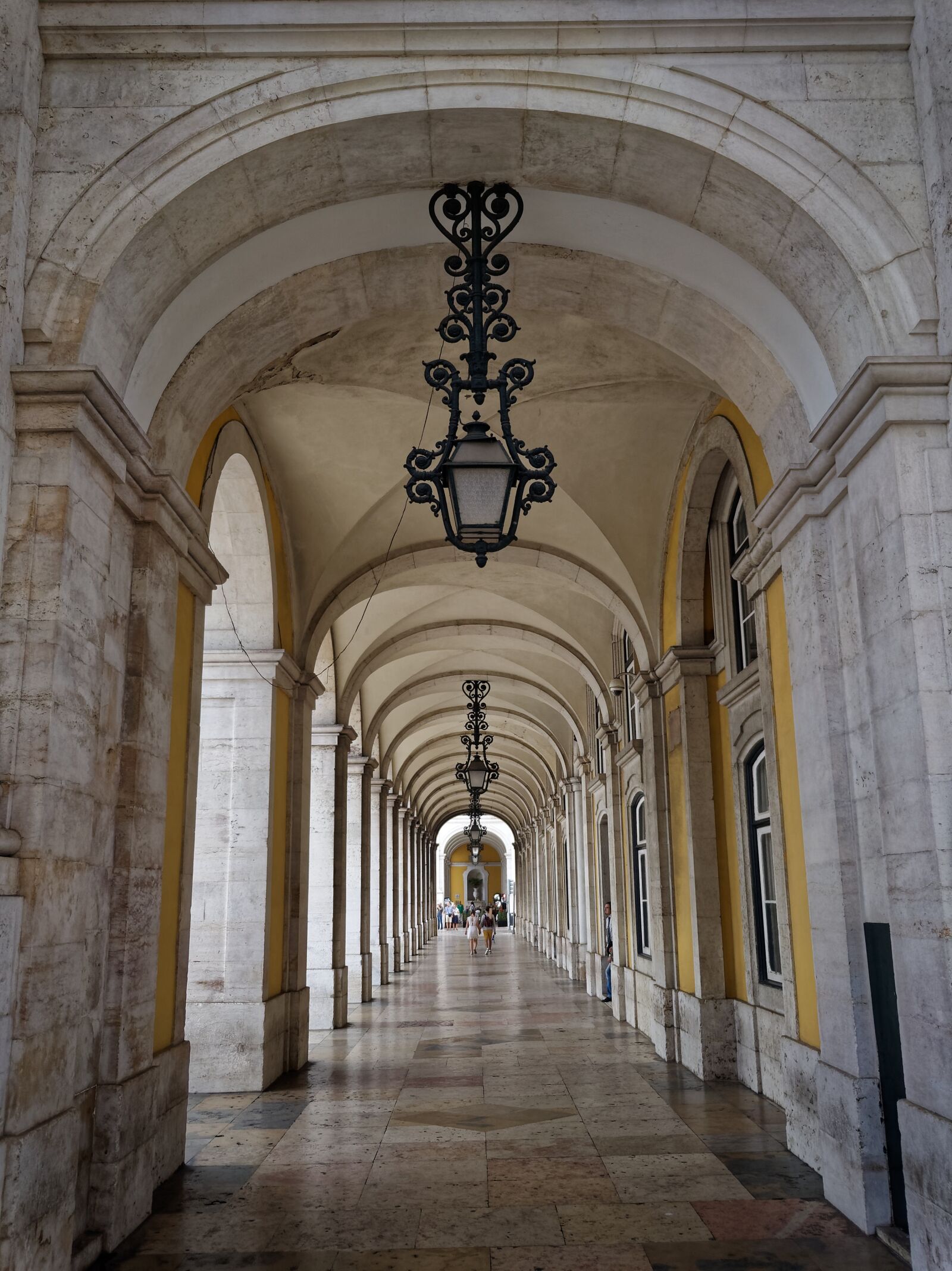 iPhone SE back camera 4.15mm f/2.2 sample photo. Arcades, lisbon, portugal photography