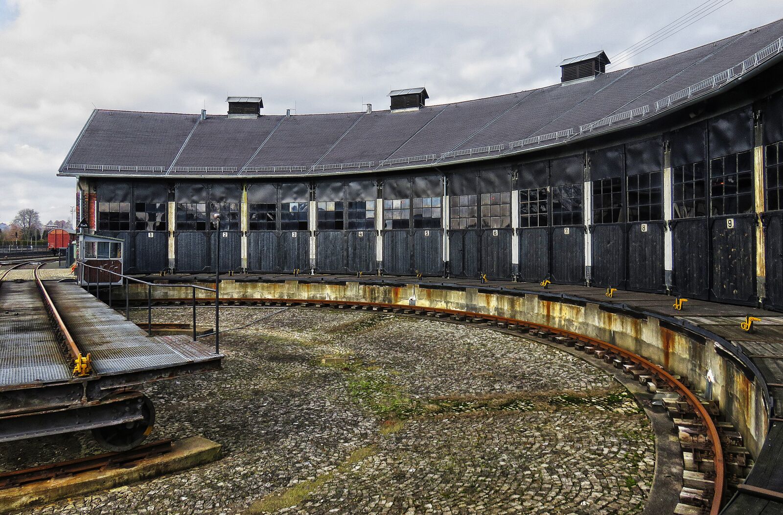 Canon PowerShot SX710 HS sample photo. Locomotive shed, hub, rails photography
