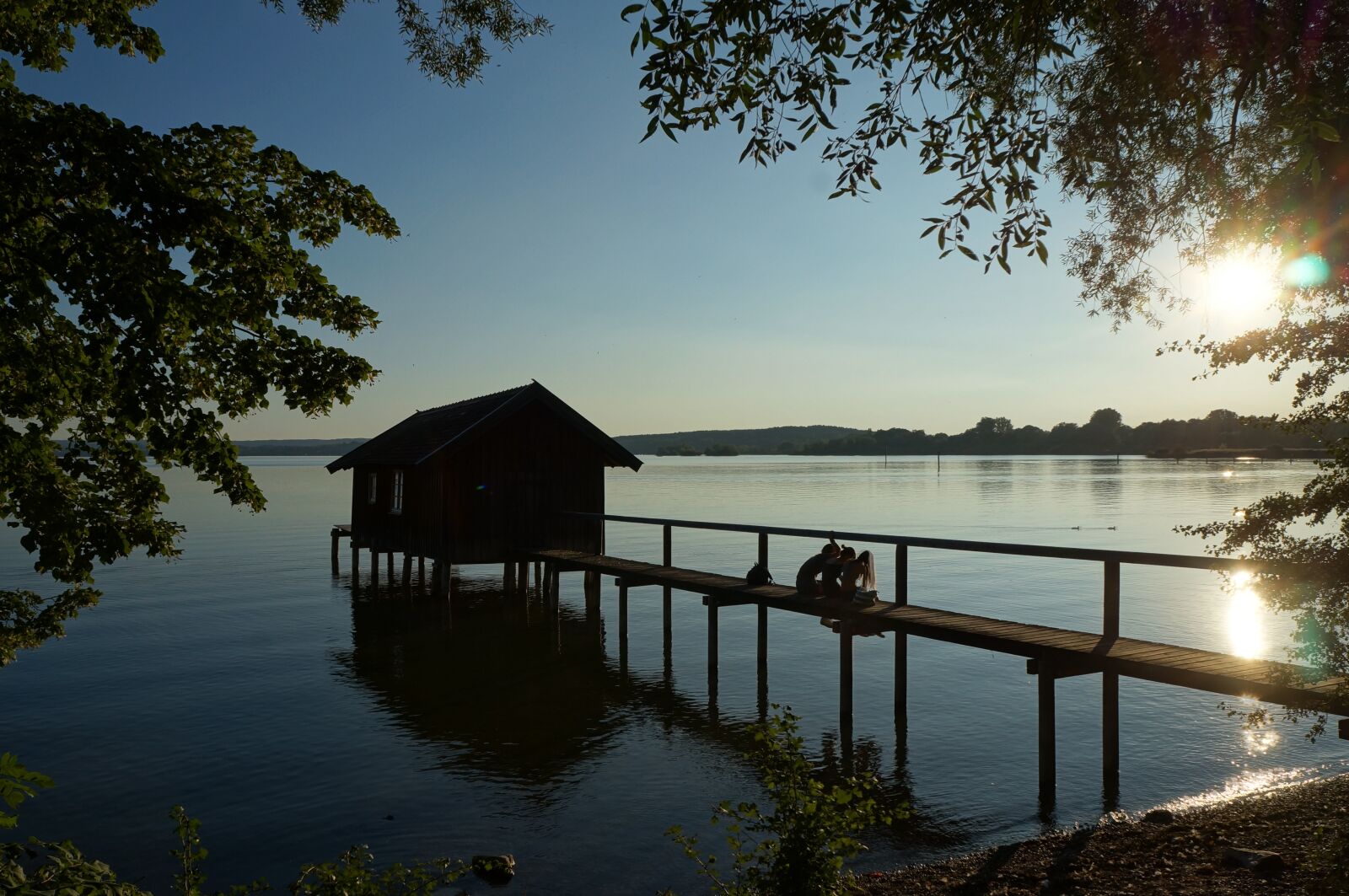 Sony Alpha NEX-F3 + Sony E 18-55mm F3.5-5.6 OSS sample photo. Ammersee, webs, boat house photography