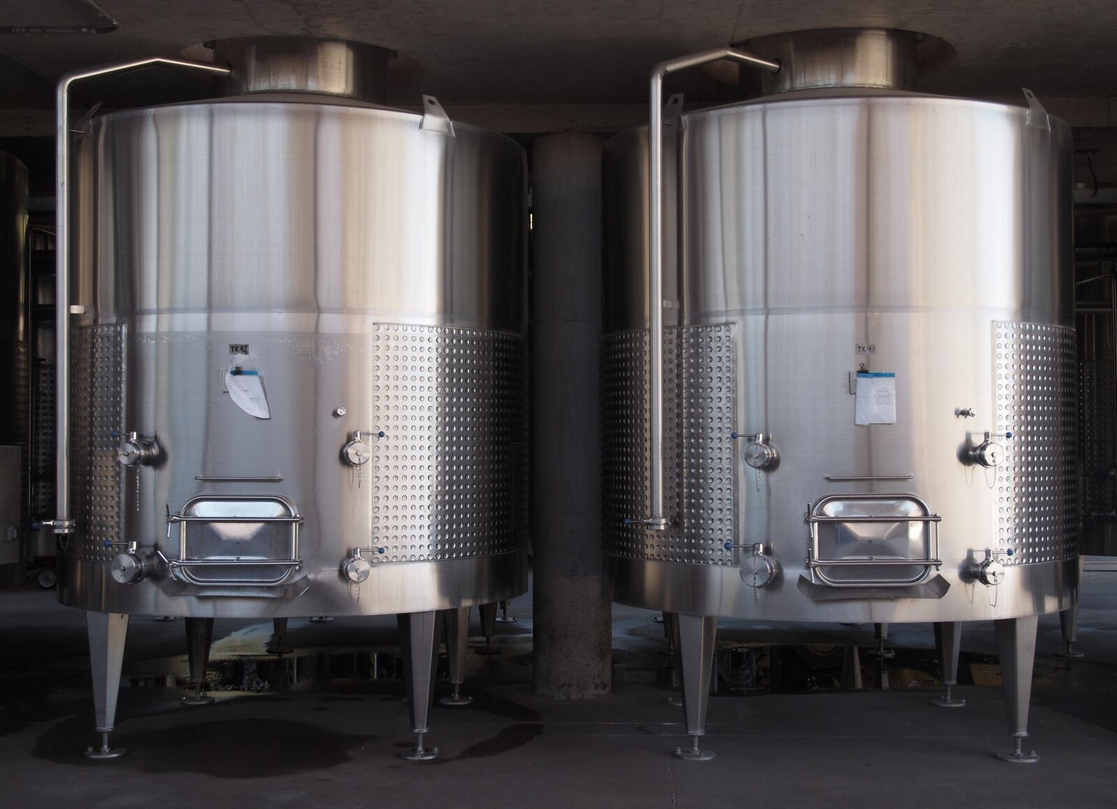 Olympus PEN E-P2 sample photo. Wine, wine making, tank photography