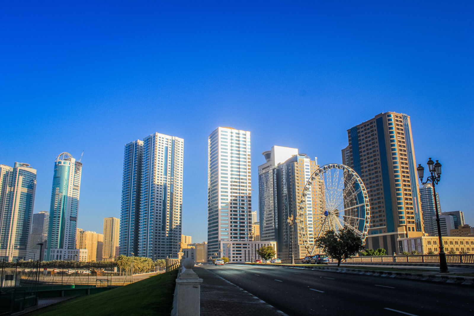 Canon EF-S 18-55mm F3.5-5.6 IS sample photo. Blue, sky, building, city photography
