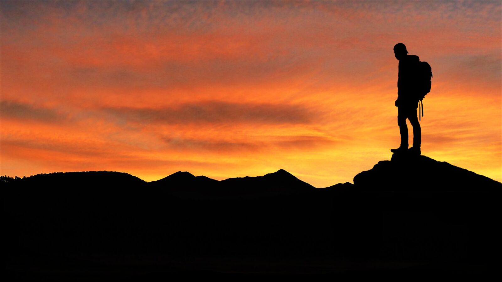 Panasonic Lumix DMC-FZ200 sample photo. Sunset, mountains, hiker photography