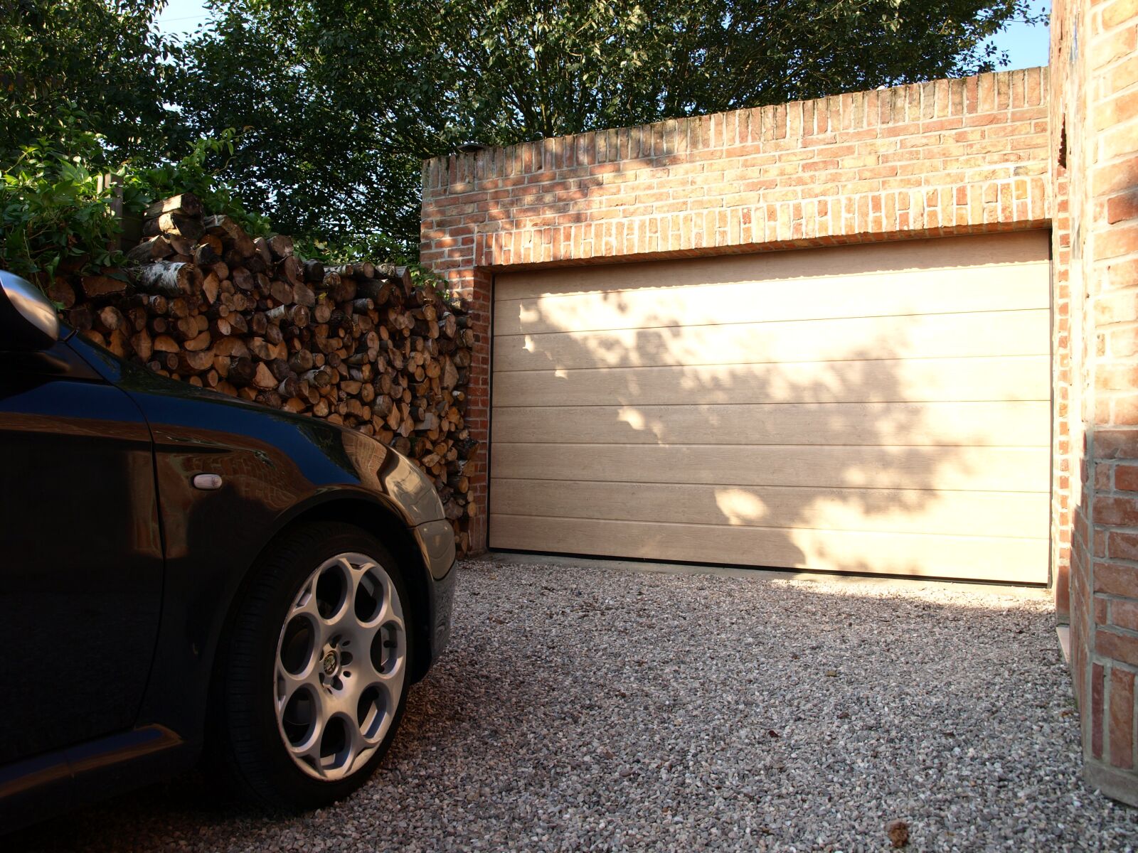 Olympus E-410 (EVOLT E-410) sample photo. Garage door, sectional, house photography