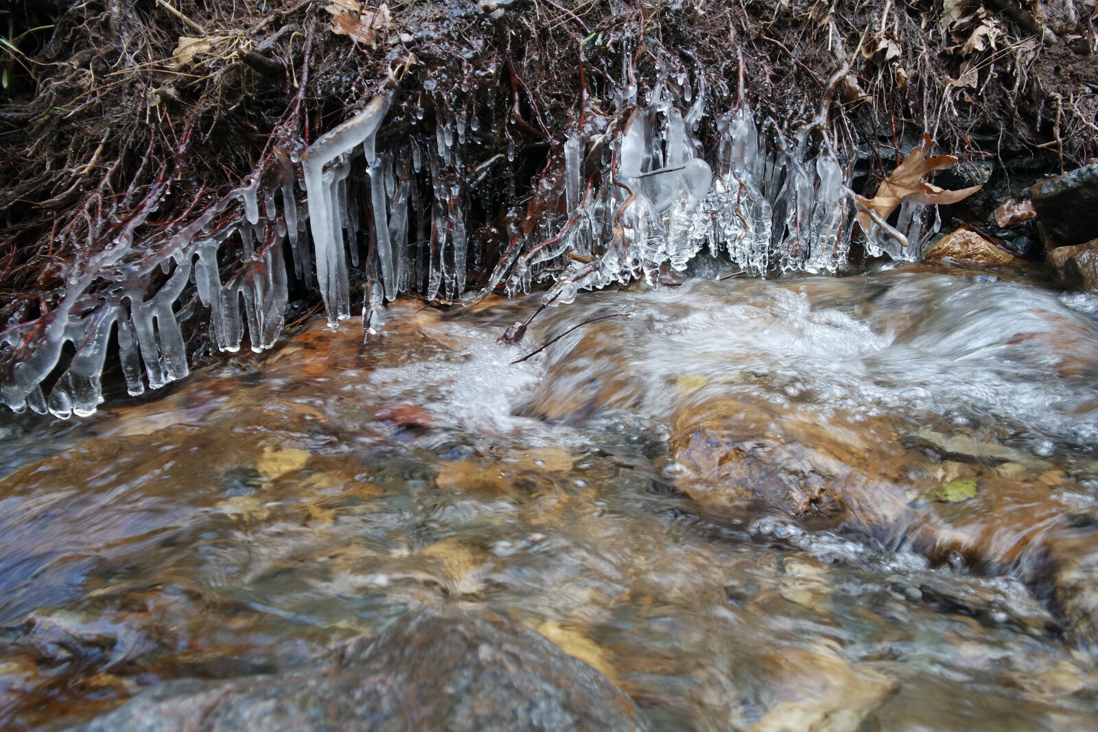 Samsung NX mini sample photo. Ice, river, stalactite, water photography